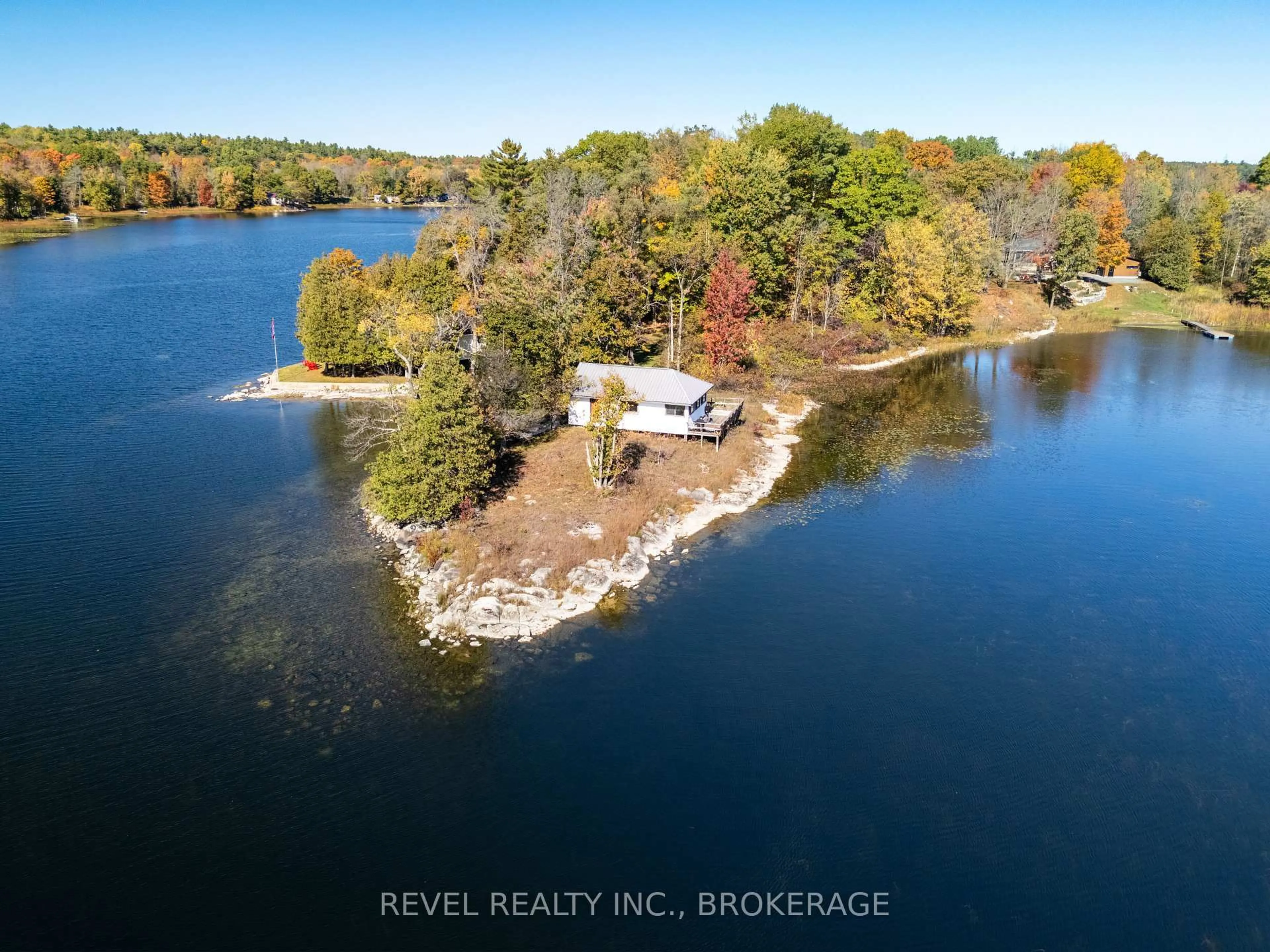 A pic from outside/outdoor area/front of a property/back of a property/a pic from drone, water/lake/river/ocean view for 1019A Kens Lane, Verona Ontario K0H 2W0