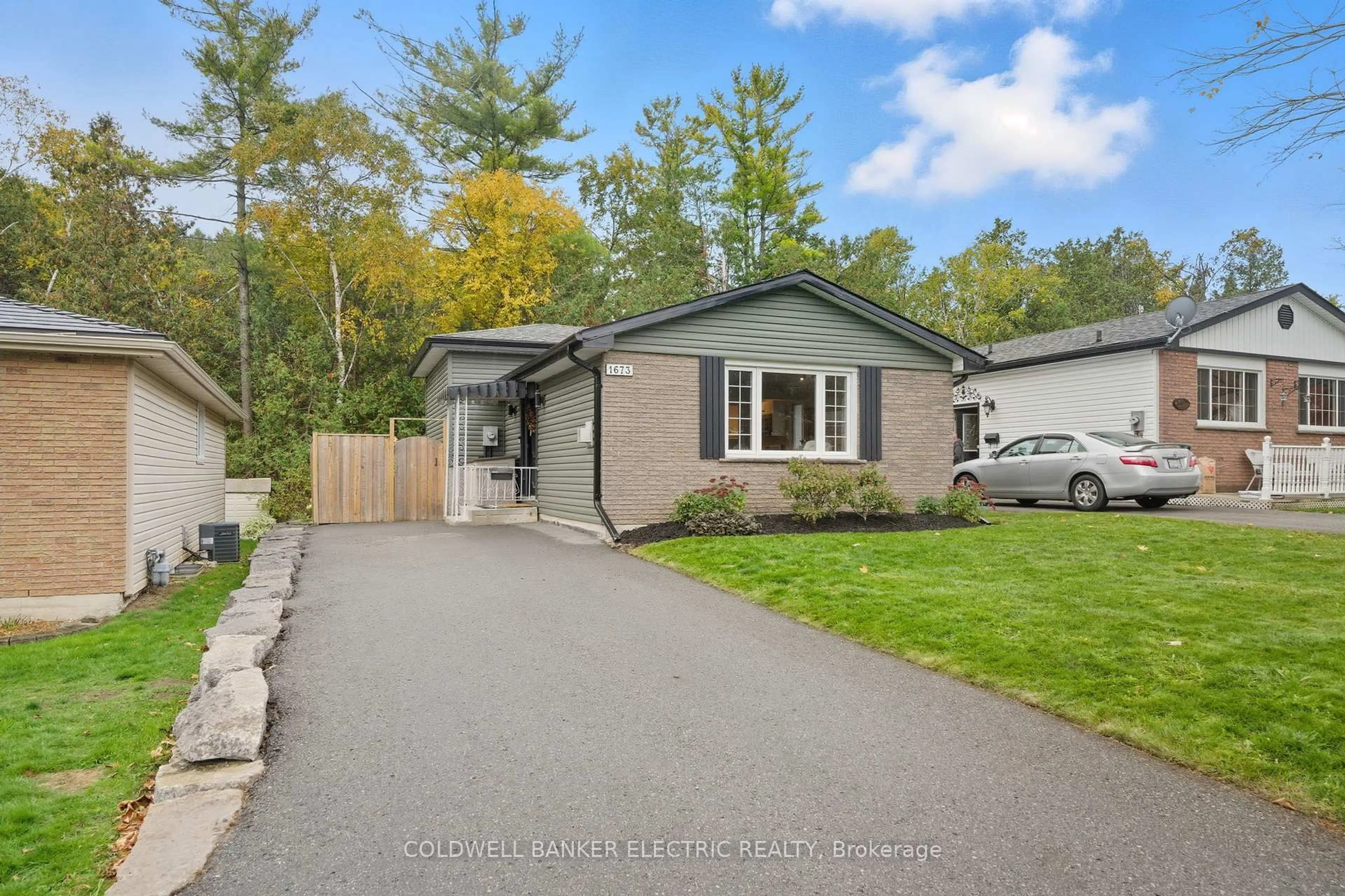Home with vinyl exterior material, street for 1673 Redwood Dr, Peterborough Ontario K9K 1M2