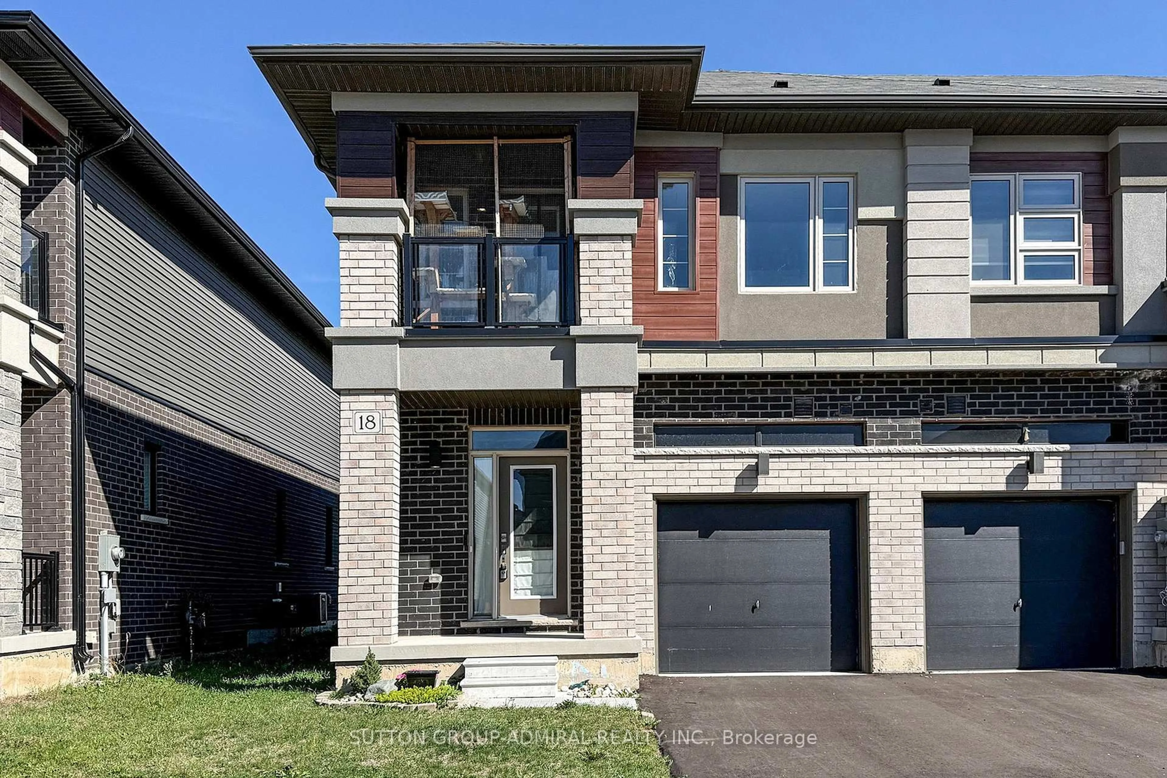 Home with brick exterior material, street for 18 Copeman Ave, Brantford Ontario N3V 0B3