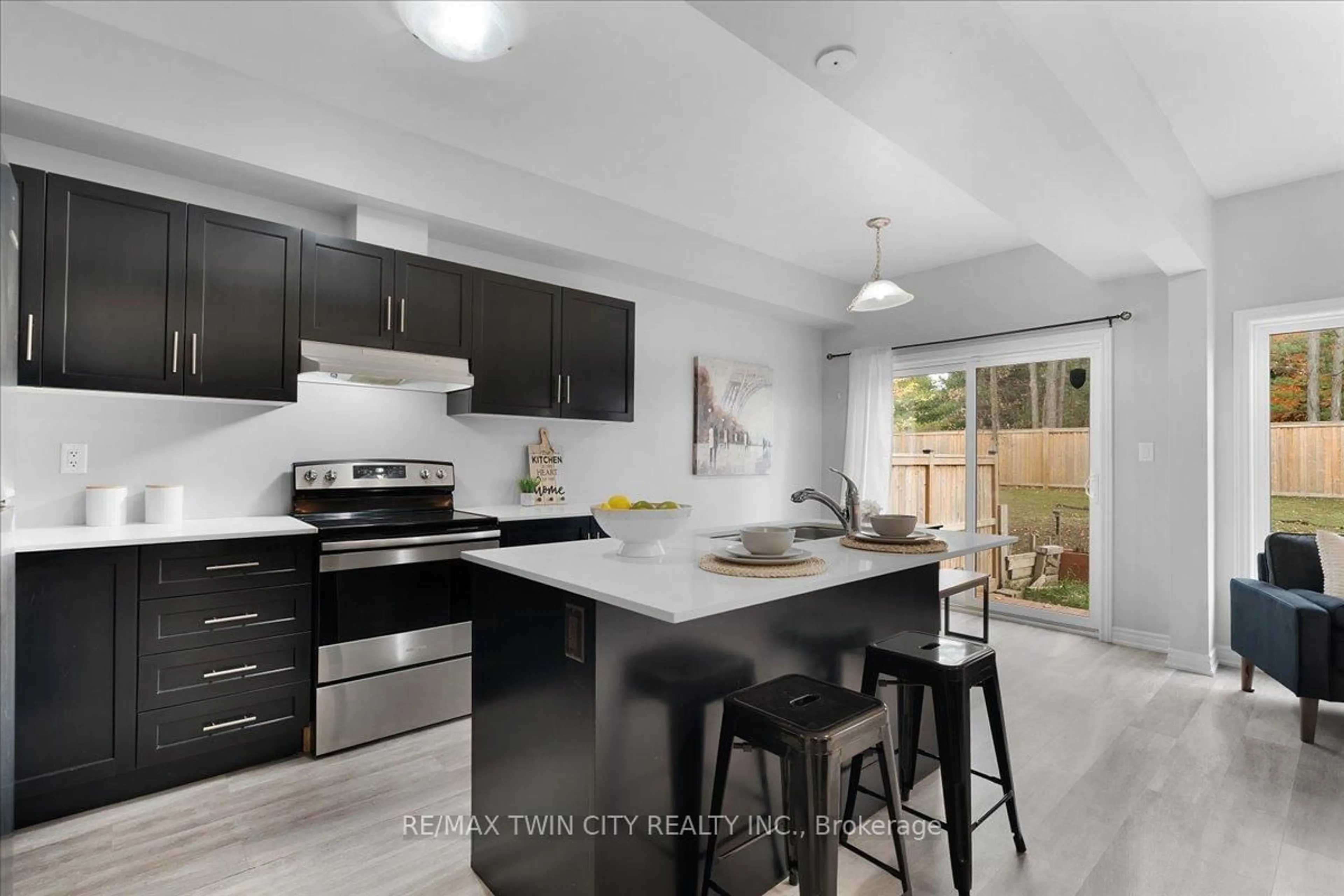 Open concept kitchen, ceramic/tile floor for 324 Equestrian Way #28, Cambridge Ontario N3E 0E2