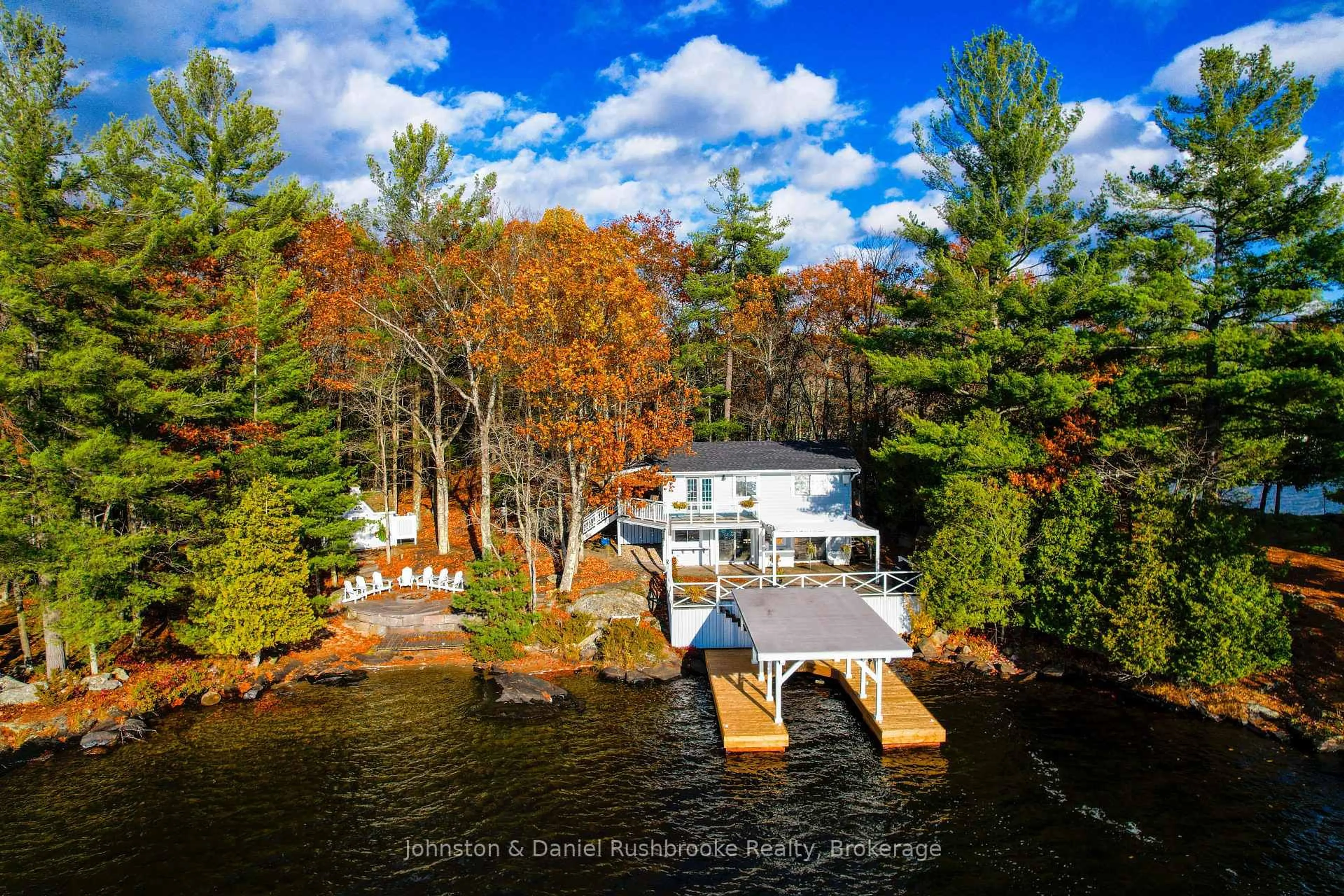 A pic from outside/outdoor area/front of a property/back of a property/a pic from drone, water/lake/river/ocean view for 44-2755 Muskoka Rd 118 West, Muskoka Lakes Ontario P0B 1J0