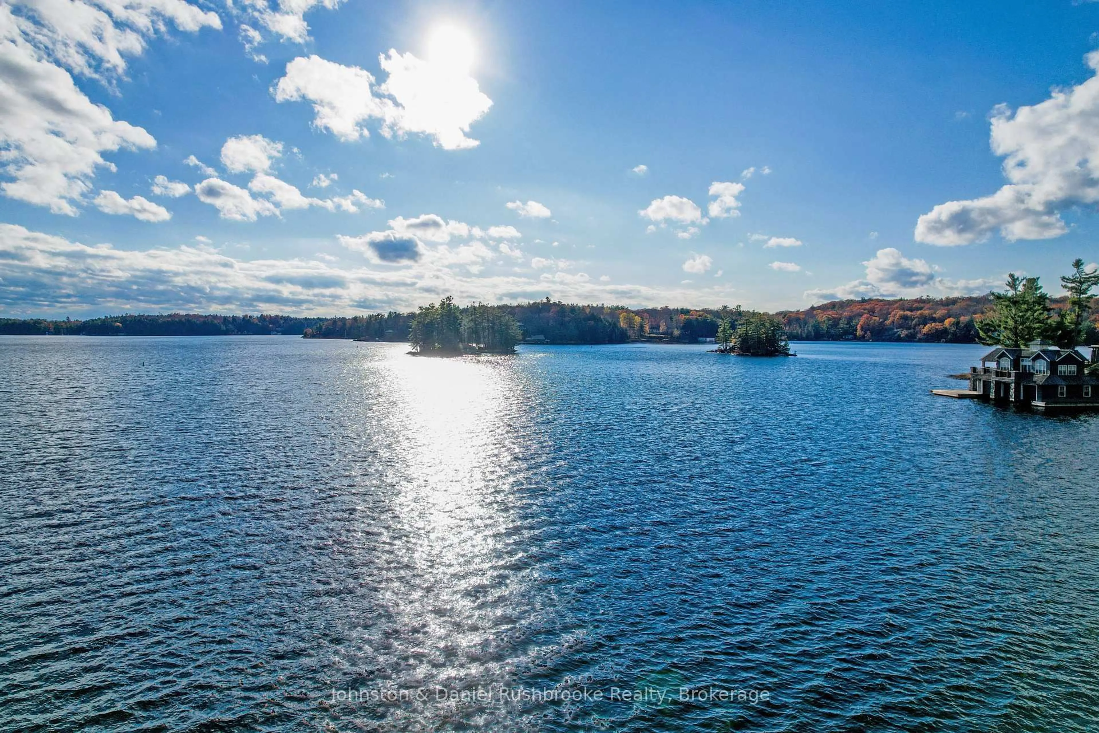 A pic from outside/outdoor area/front of a property/back of a property/a pic from drone, water/lake/river/ocean view for 44-2755 Muskoka Rd 118 West, Muskoka Lakes Ontario P0B 1J0