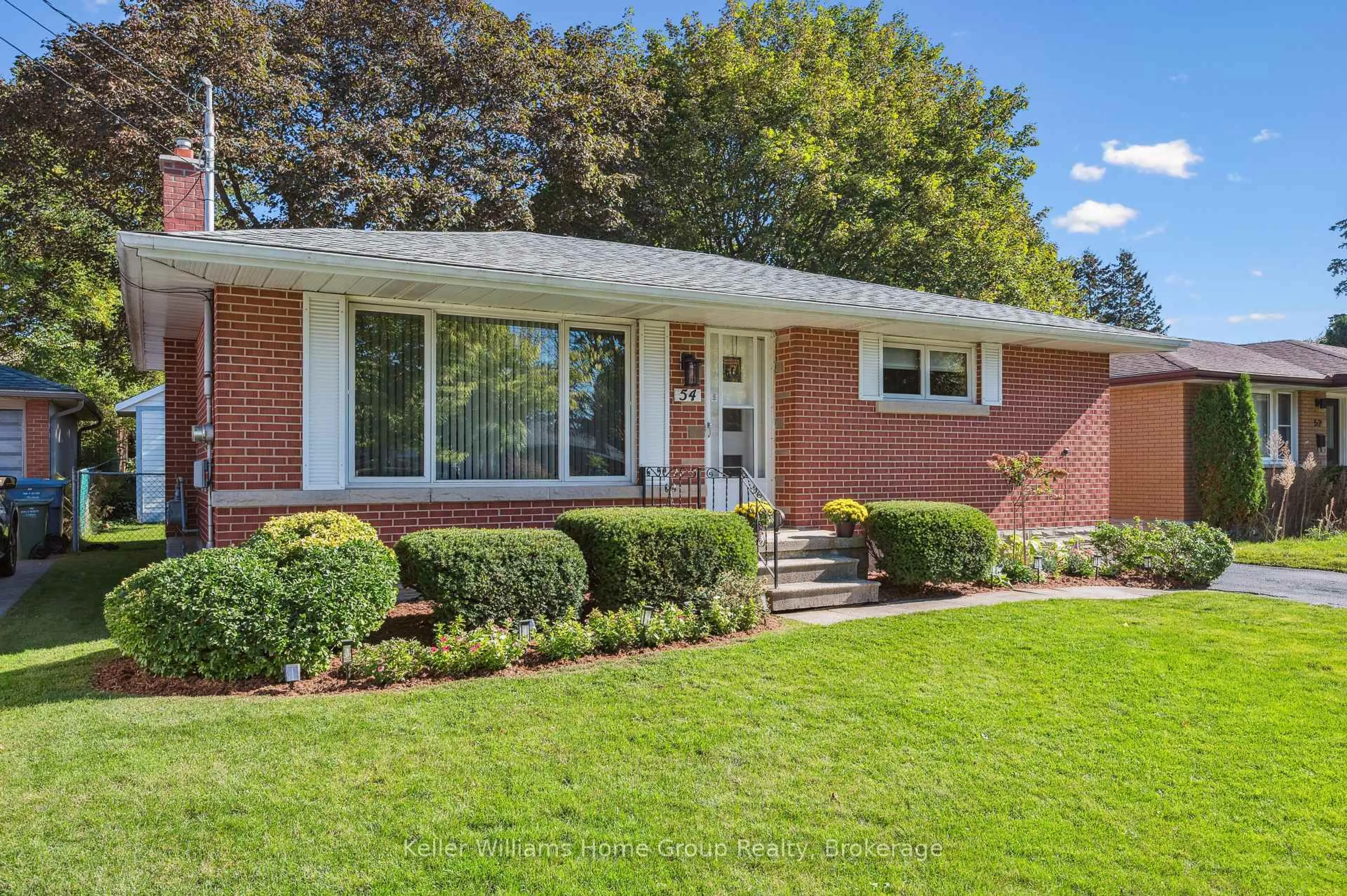 Home with brick exterior material, street for 54 Ottawa Cres, Guelph Ontario N1E 2A6