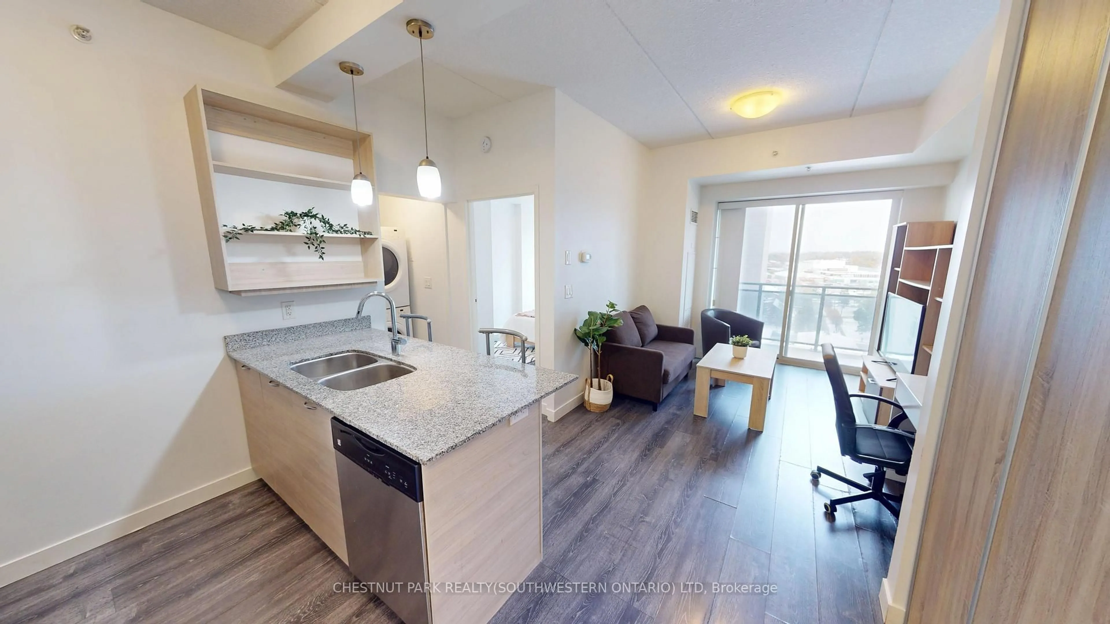 Open concept kitchen, wood/laminate floor for 318 Spruce St #1003, Waterloo Ontario N2L 3M7