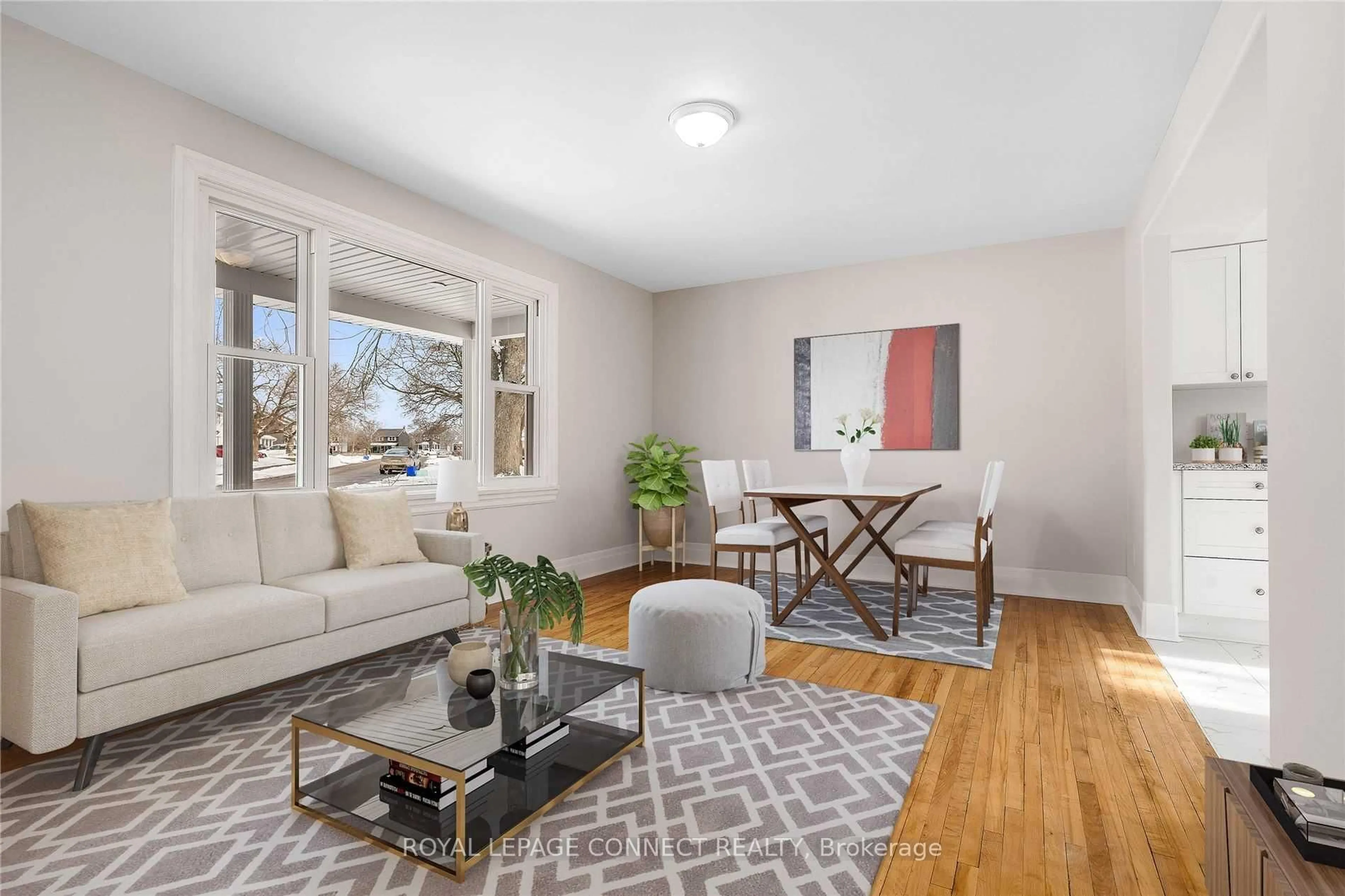 Living room with furniture, wood/laminate floor for 13 Diver Belt Dr, Prince Edward County Ontario K0K 2T0