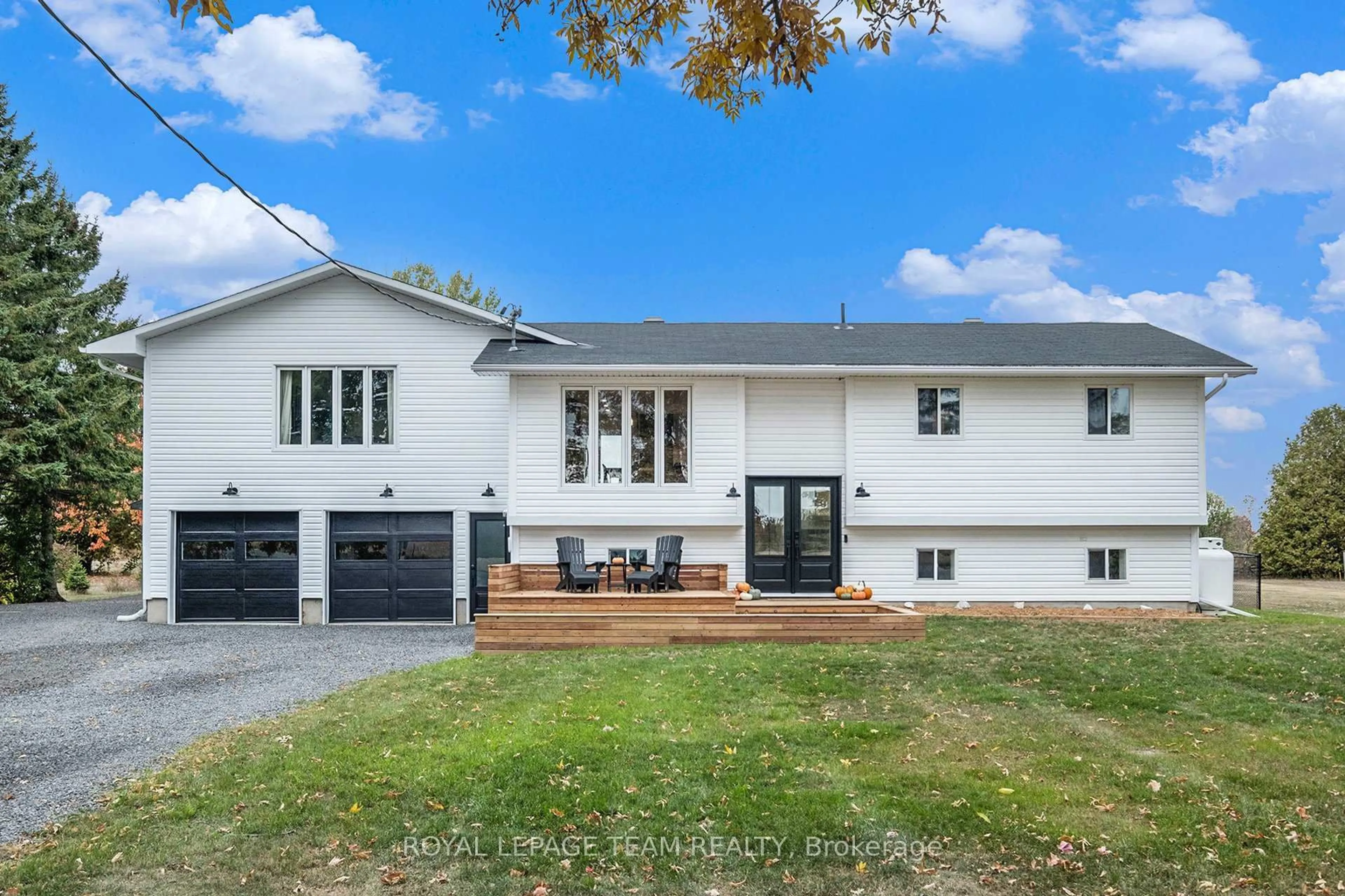 Home with vinyl exterior material, street for 1421 Stone Rd, North Grenville Ontario K0G 1S0