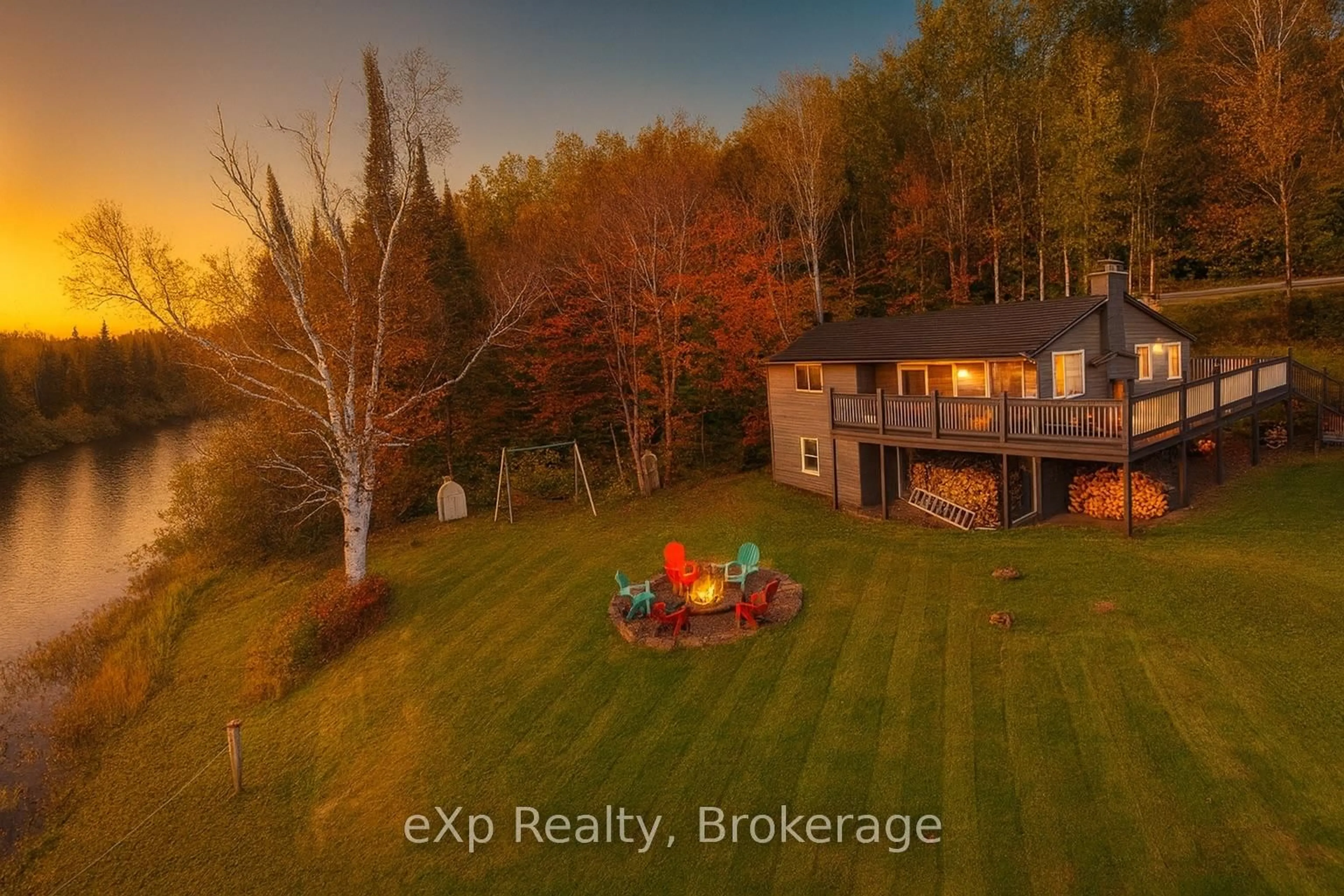 A pic from outside/outdoor area/front of a property/back of a property/a pic from drone, water/lake/river/ocean view for 249 River Dr, Burk's Falls Ontario P0A 1C0
