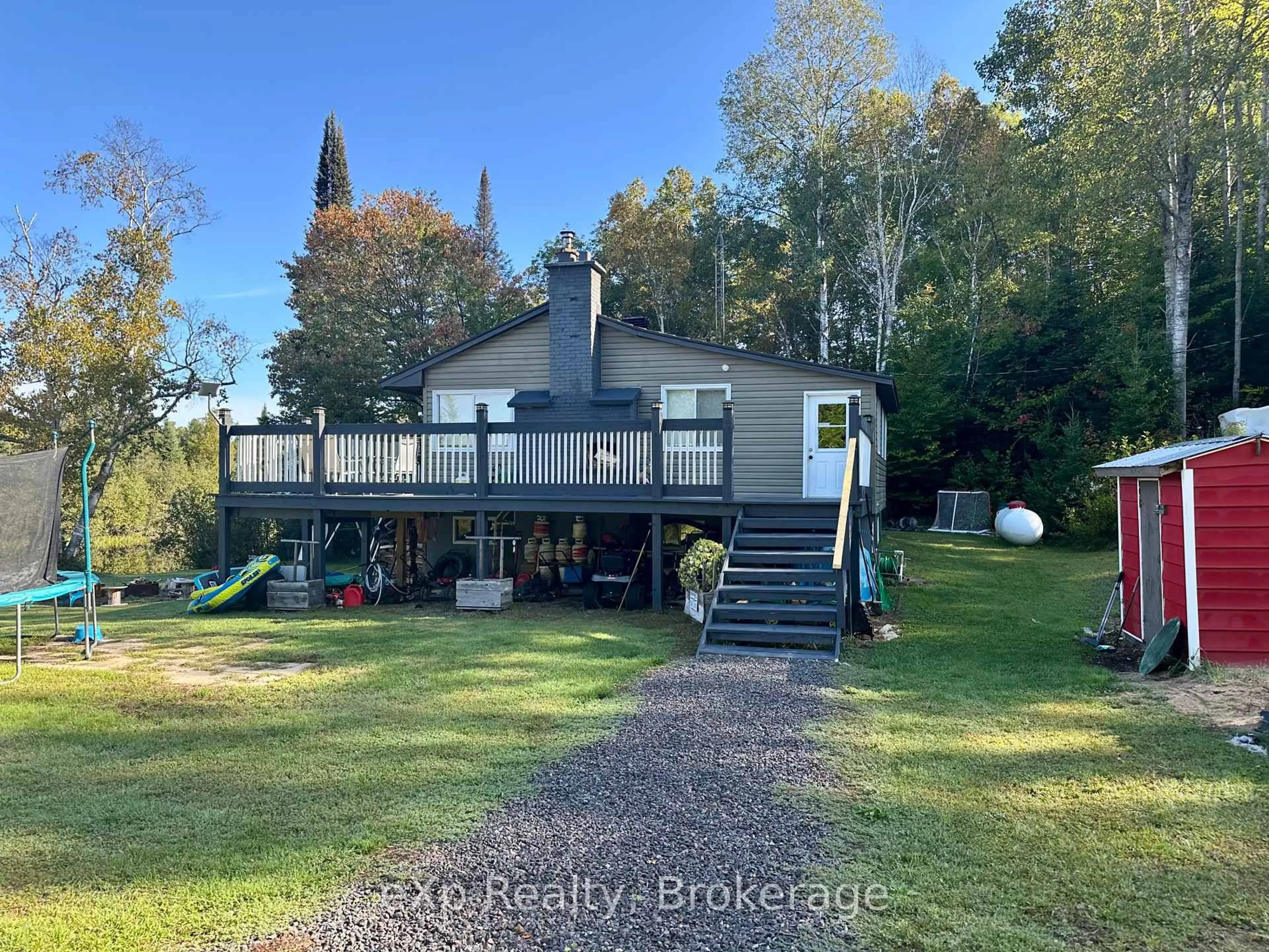 A pic from outside/outdoor area/front of a property/back of a property/a pic from drone, water/lake/river/ocean view for 249 River Dr, Burk's Falls Ontario P0A 1C0