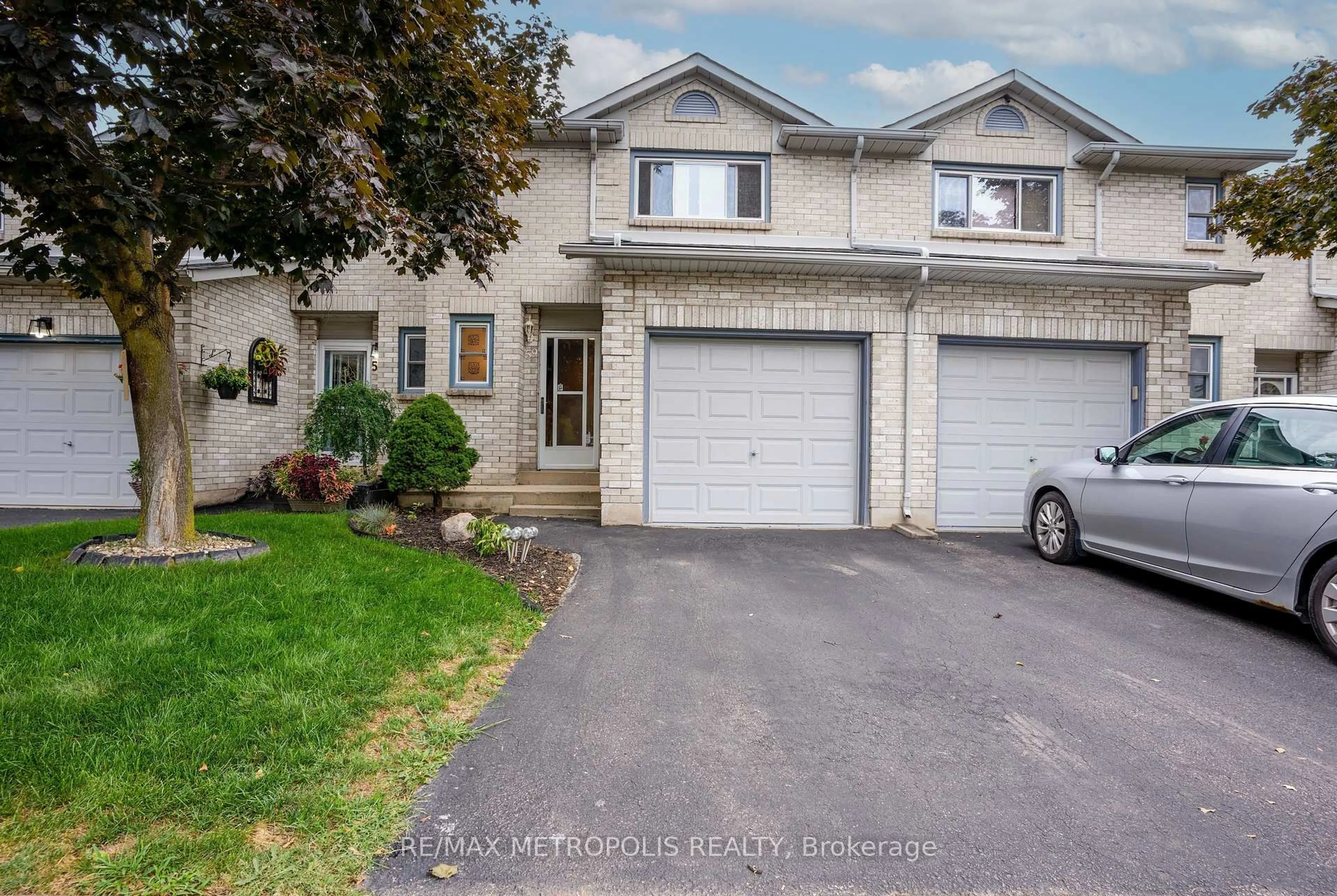 A pic from outside/outdoor area/front of a property/back of a property/a pic from drone, street for 2 Royalwood Crt #59, Hamilton Ontario L8E 4Z1