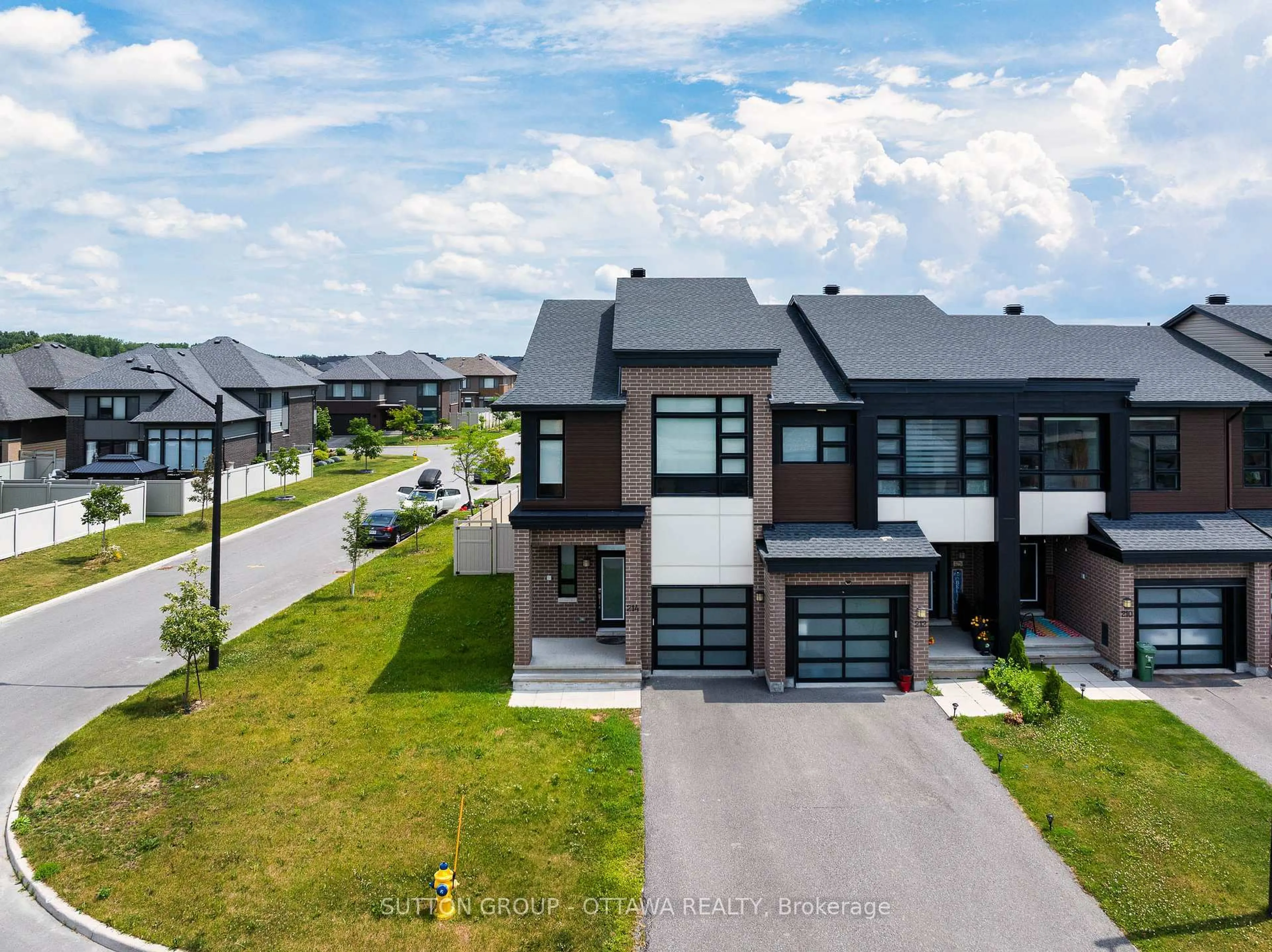 A pic from outside/outdoor area/front of a property/back of a property/a pic from drone, street for 214 Big Dipper St, Manotick Ontario K4M 0K5