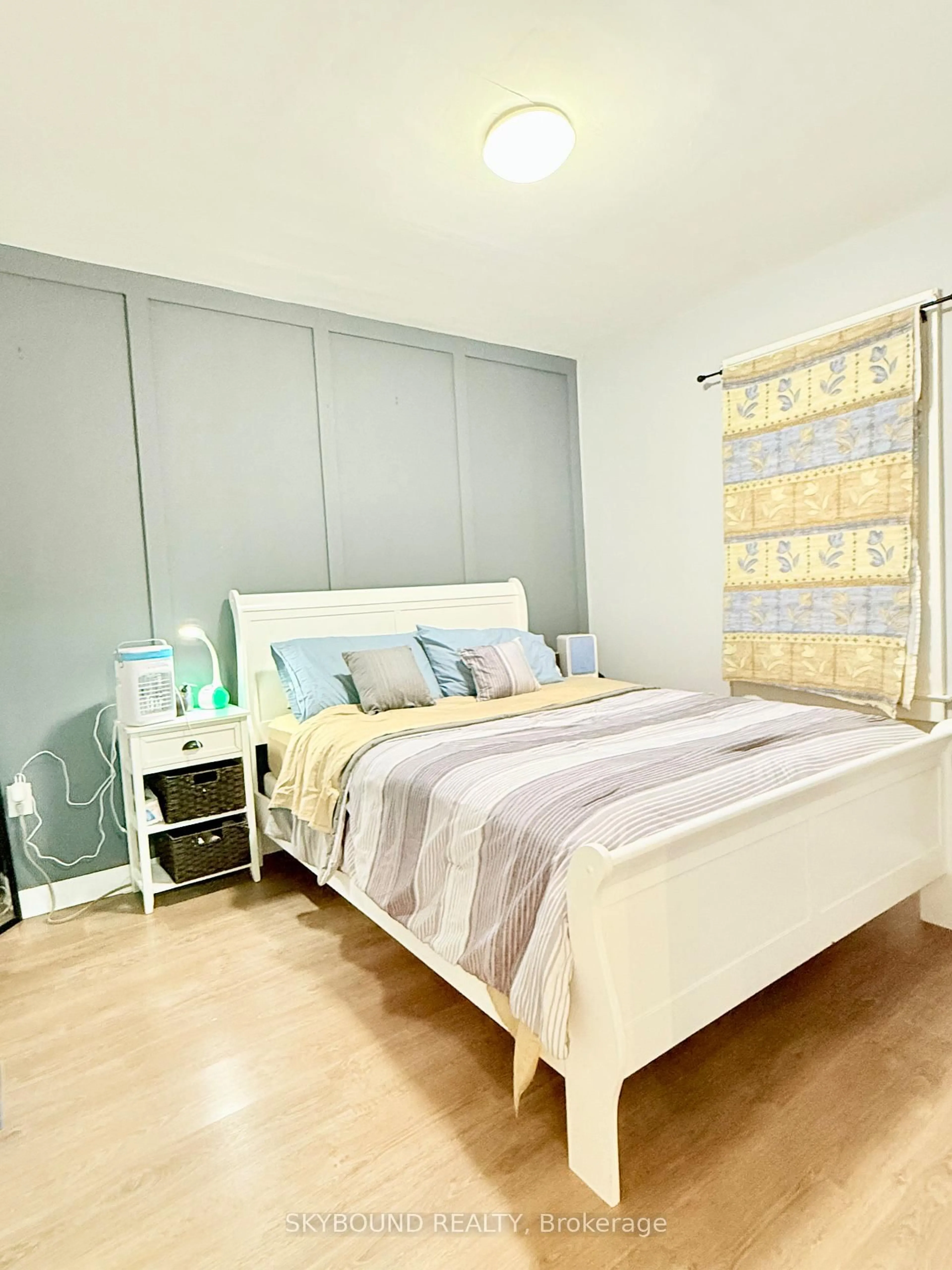 Bedroom with bed, wood/laminate floor for 1723 Langlois Ave, Windsor Ontario N8X 4M4