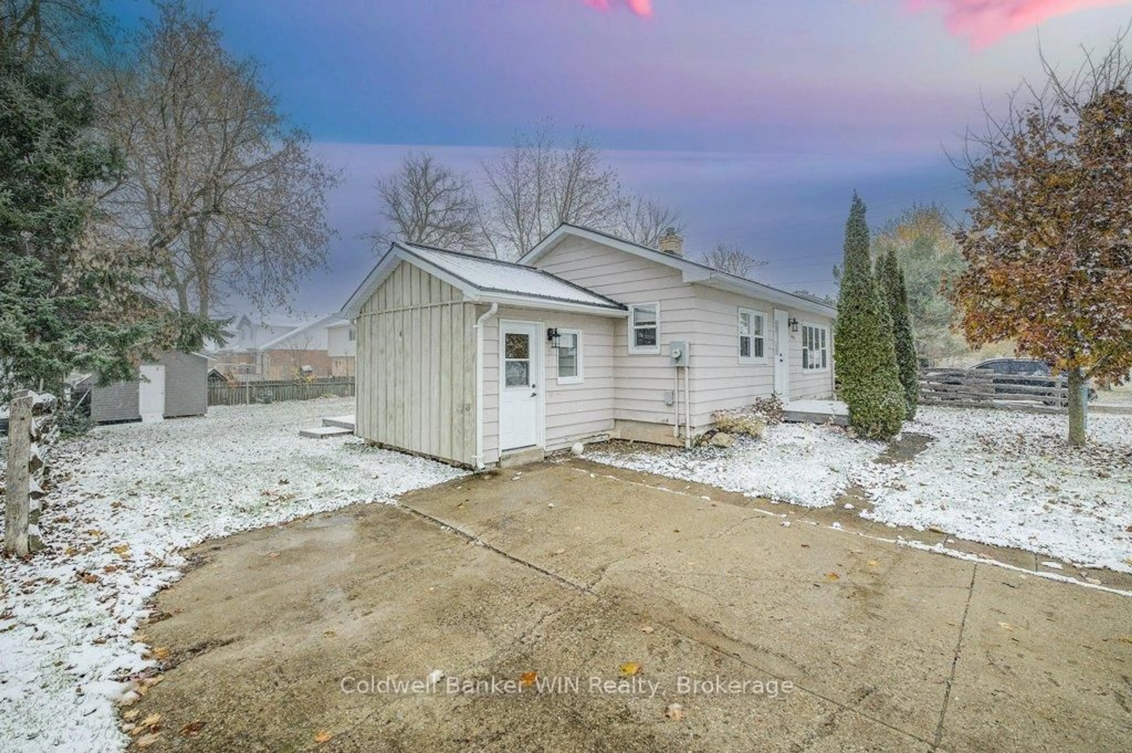 A pic from outside/outdoor area/front of a property/back of a property/a pic from drone, street for 383 Wellington St, Wellington North Ontario N0G 2L2