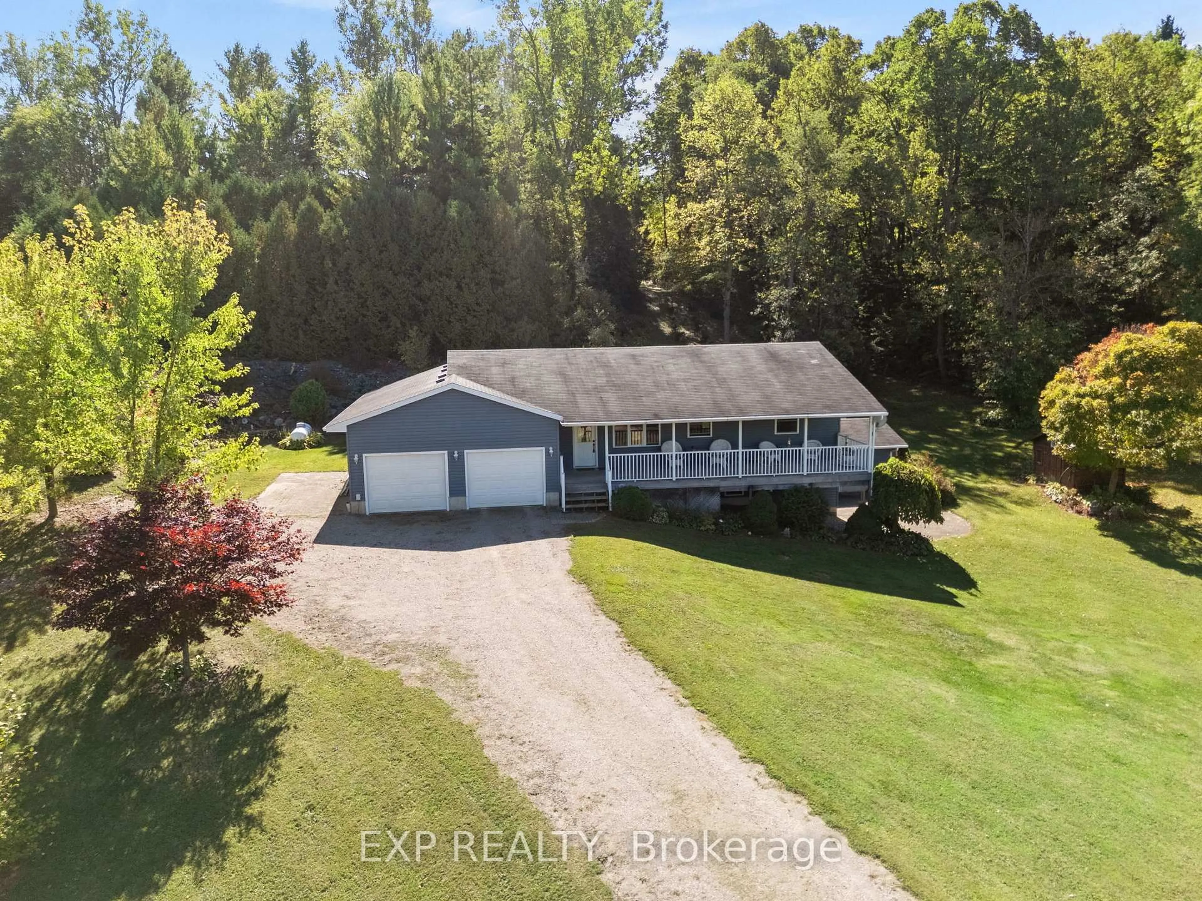 A pic from outside/outdoor area/front of a property/back of a property/a pic from drone, water/lake/river/ocean view for 30680 Hungry Hollow Rd, North Middlesex Ontario N0M 1B0