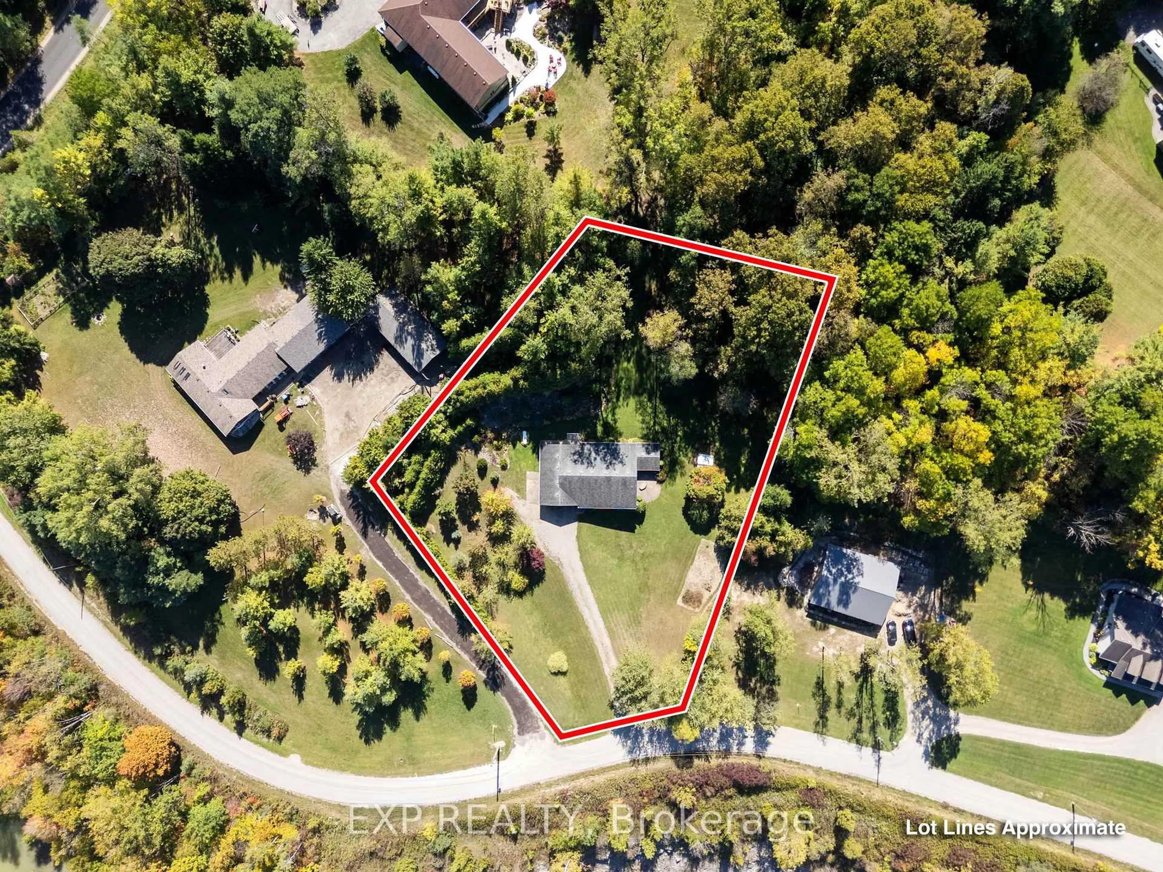 A pic from outside/outdoor area/front of a property/back of a property/a pic from drone, street for 30680 Hungry Hollow Rd, North Middlesex Ontario N0M 1B0