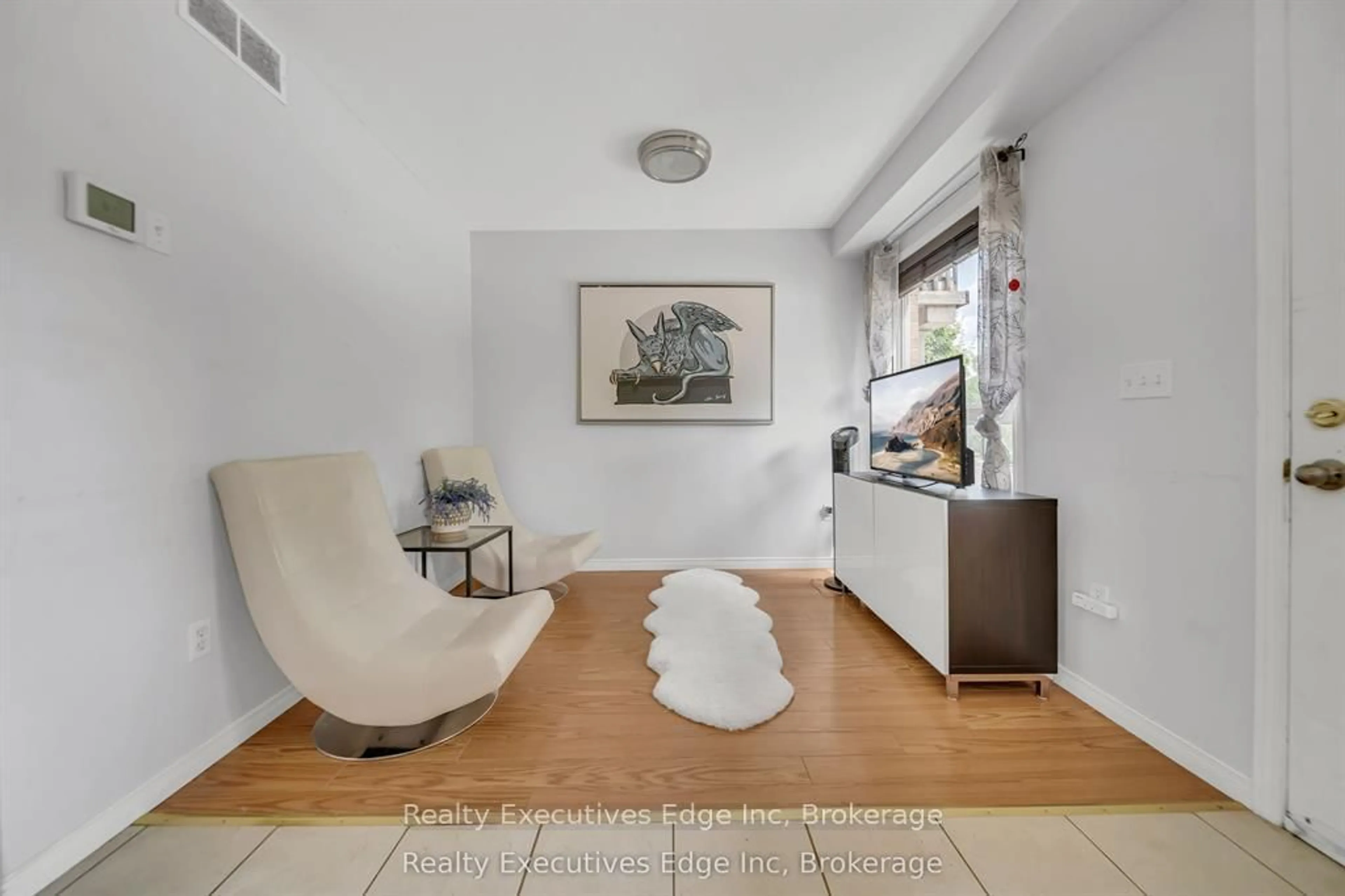 Living room with furniture, unknown for 142 York Rd #5, Guelph Ontario N1E 3E9