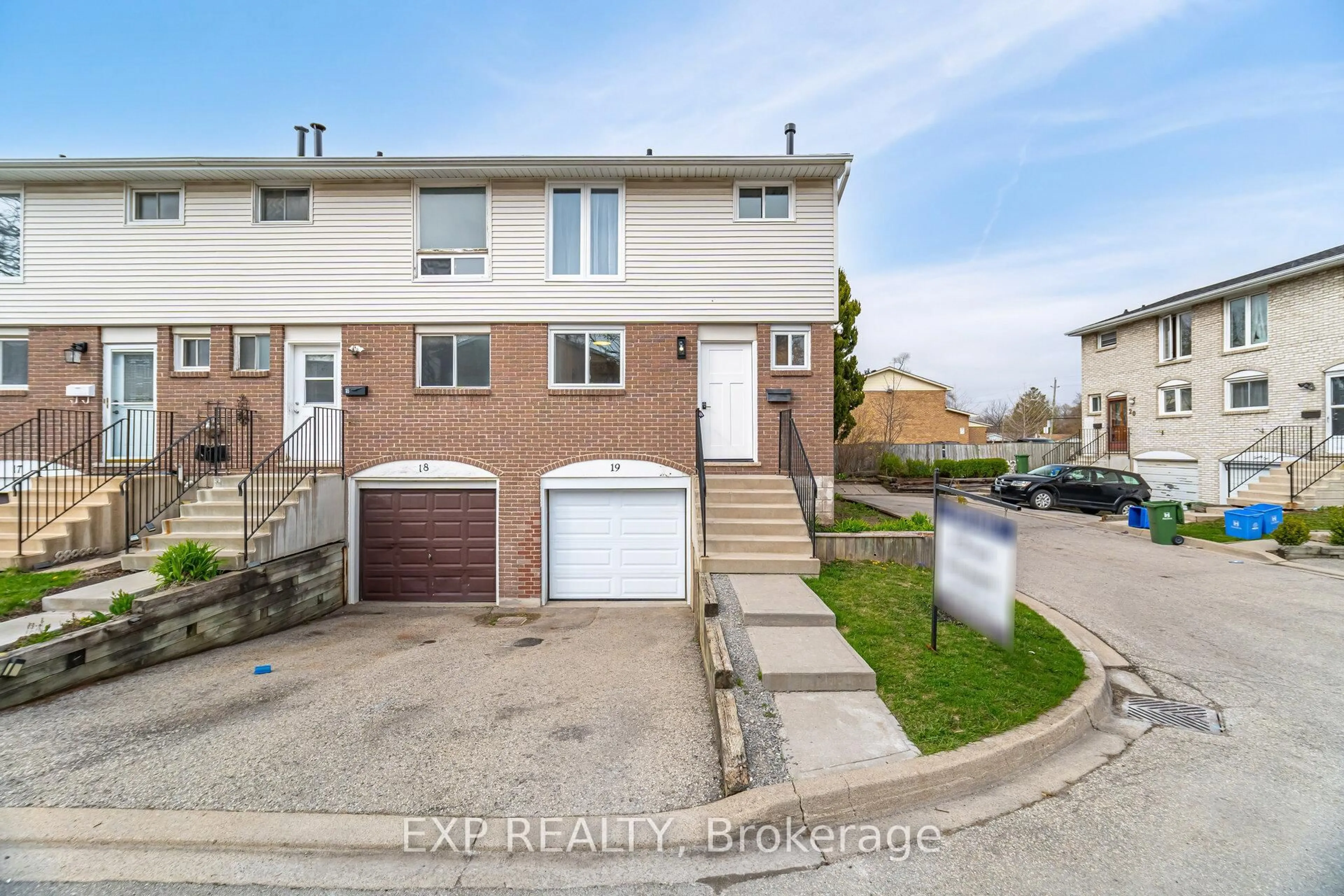 A pic from outside/outdoor area/front of a property/back of a property/a pic from drone, street for 120 Quigley Rd #19, Hamilton Ontario L8K 6L4