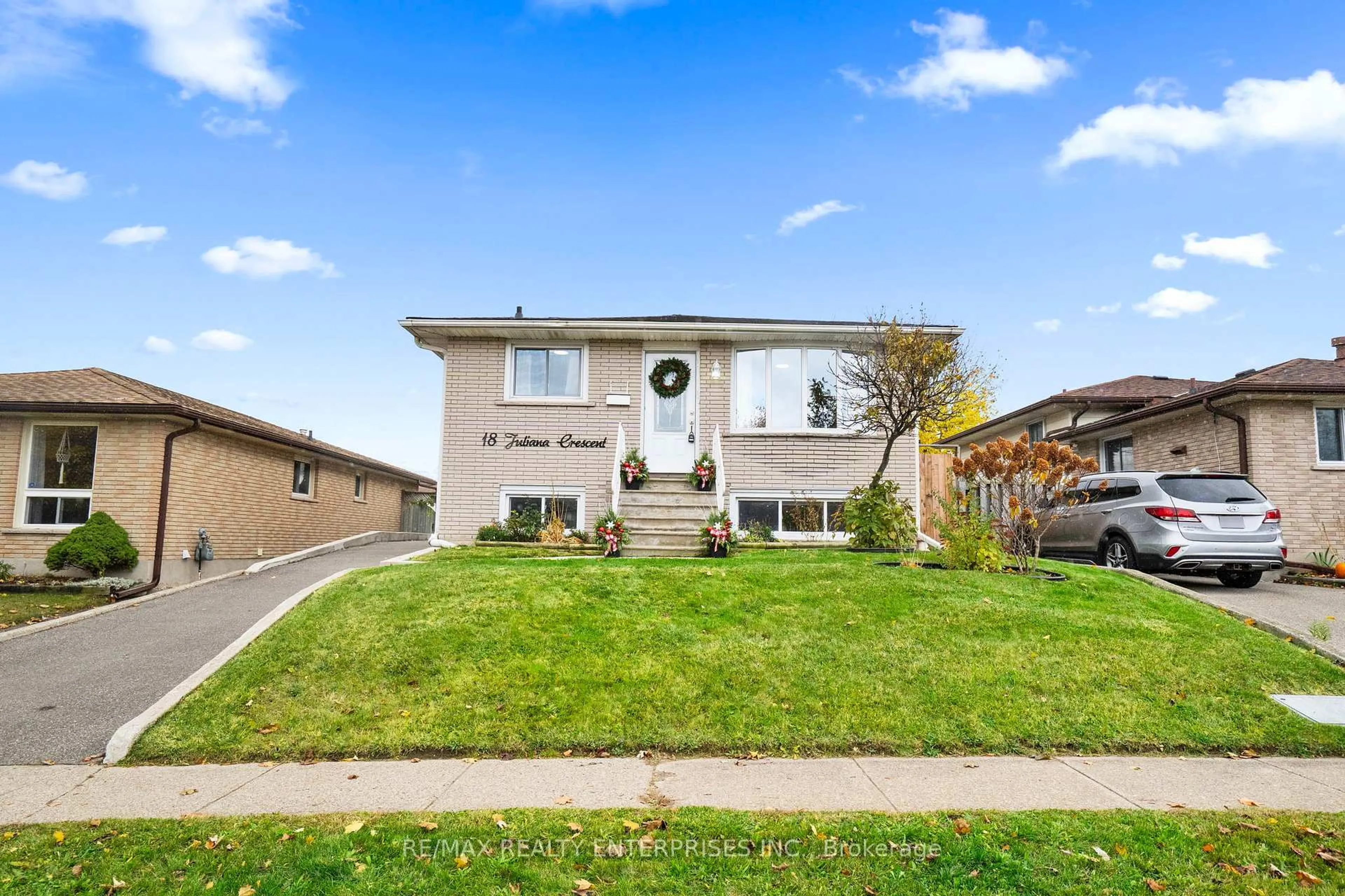 Home with vinyl exterior material, street for 18 Juliana Cres, Cambridge Ontario N1R 6W6