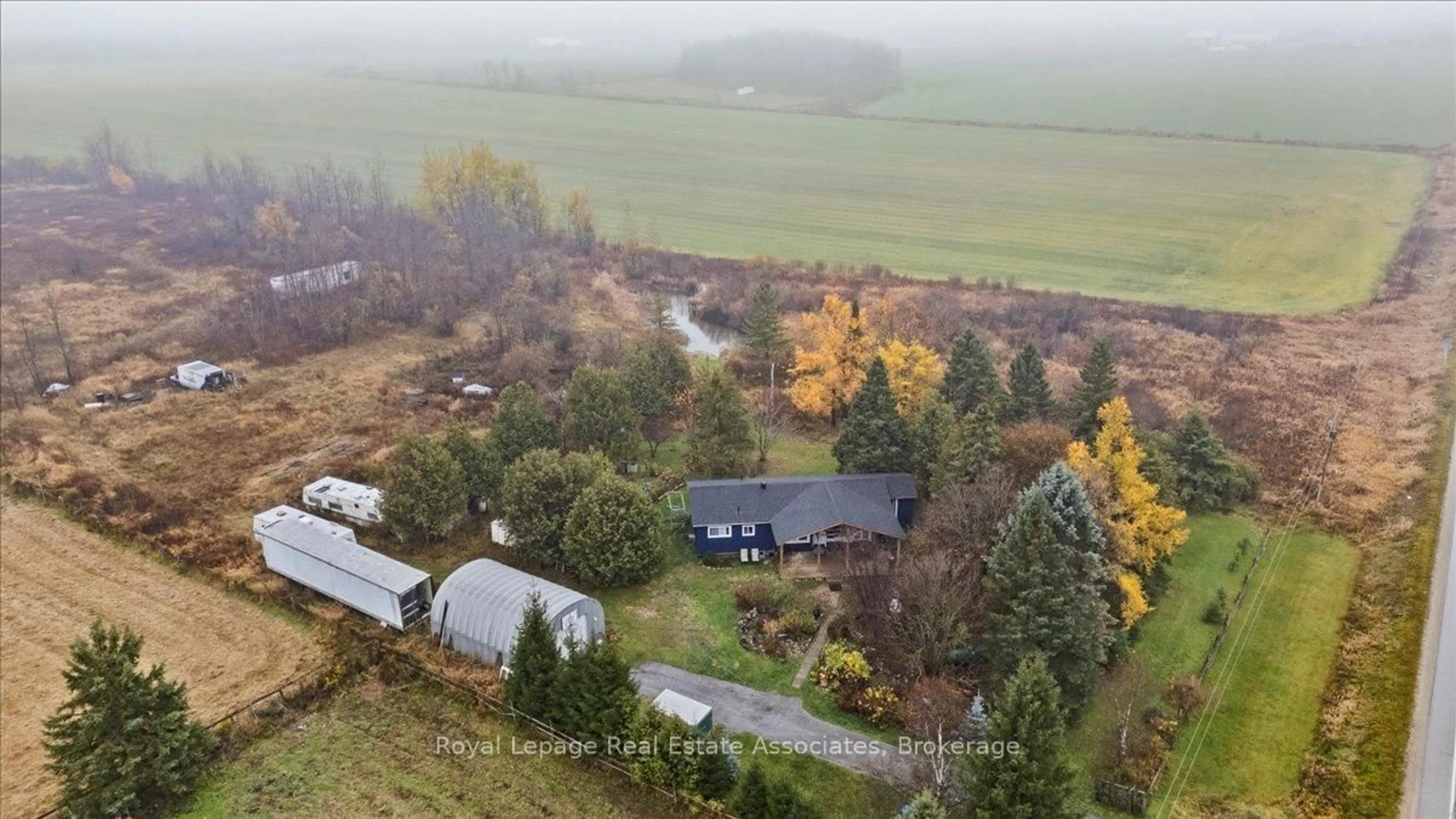A pic from outside/outdoor area/front of a property/back of a property/a pic from drone, unknown for 180118 Grey Road 9 Rd, Southgate Ontario N0C 1B0