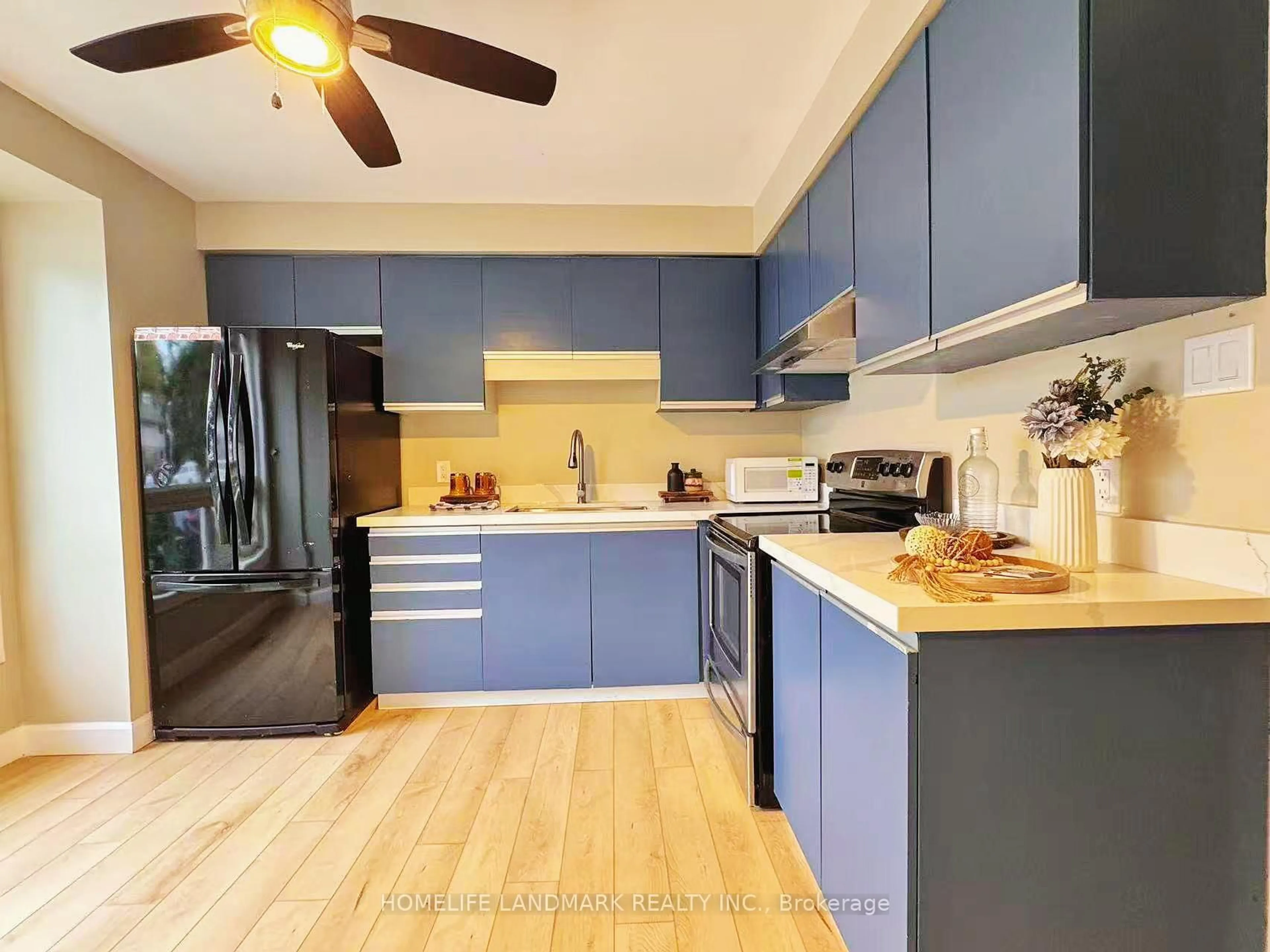 Open concept kitchen, wood/laminate floor for 550 Second St #45, London East Ontario N5V 3S3