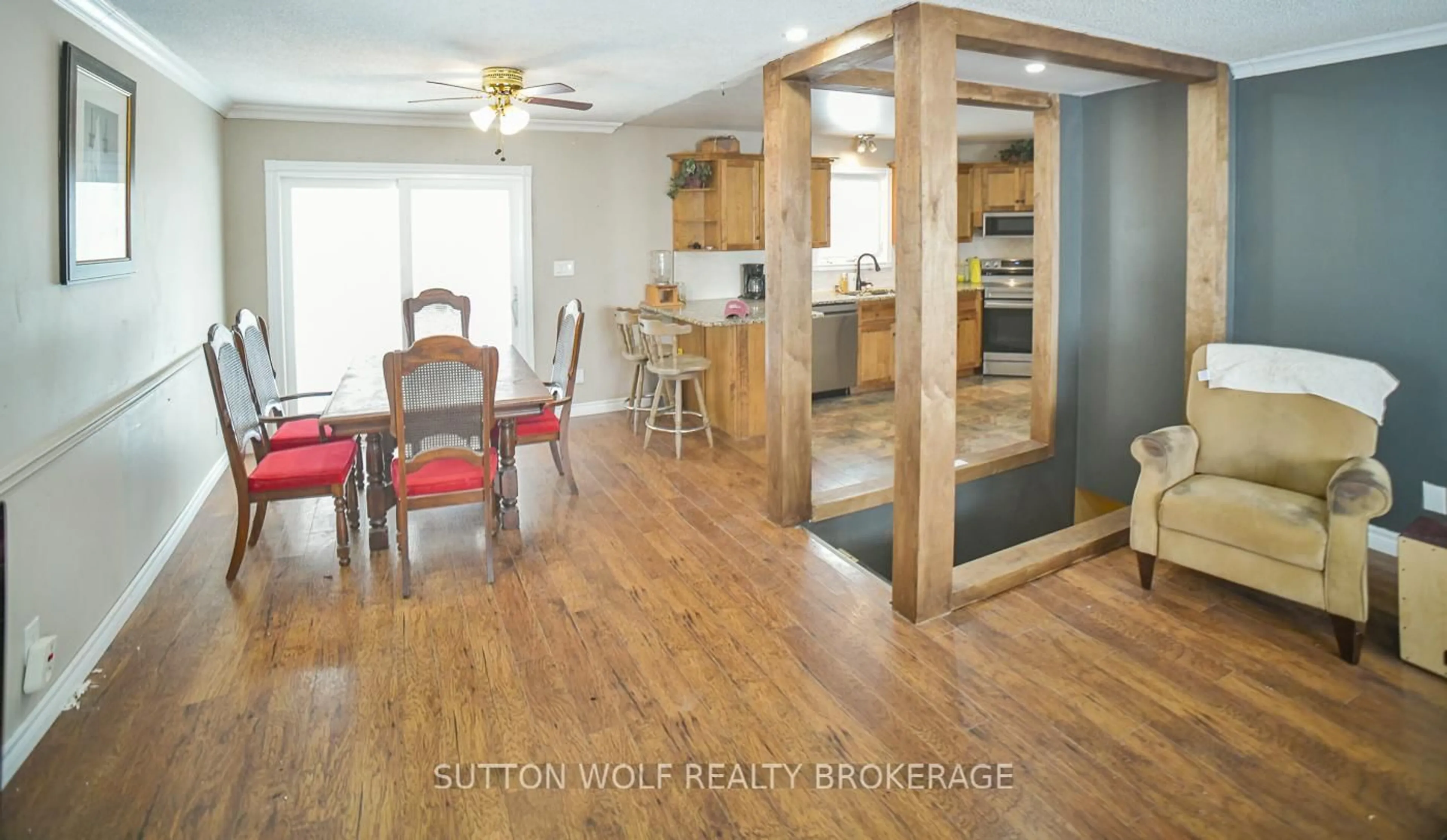 Open concept kitchen, wood/laminate floor for 1920 Melwood Rd, Adelaide Metcalfe Ontario N7G 3H5