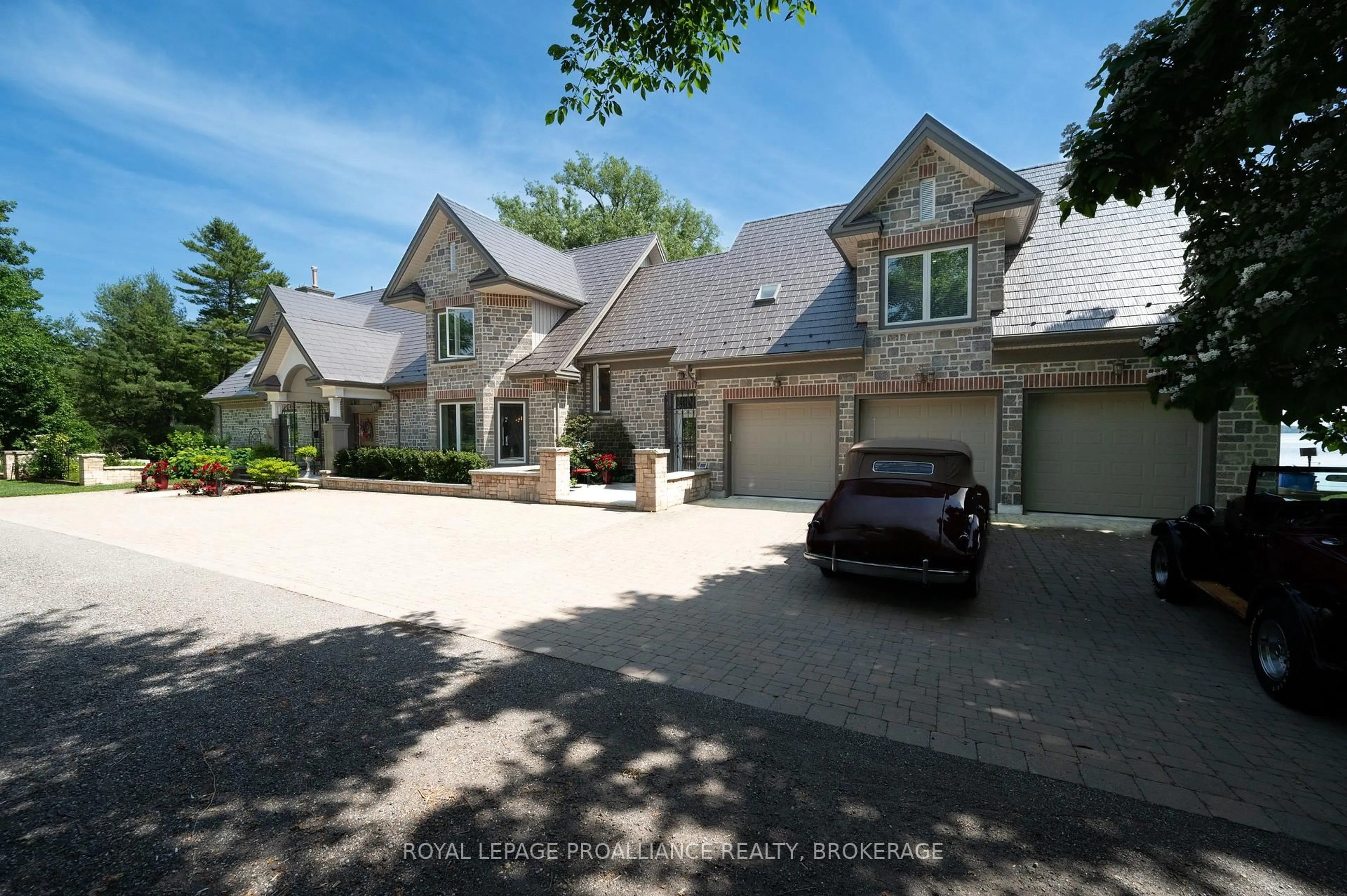 A pic from outside/outdoor area/front of a property/back of a property/a pic from drone, street for 147 1000 Island Pkwy, Leeds and the Thousand Islands Ontario K7G 2V4