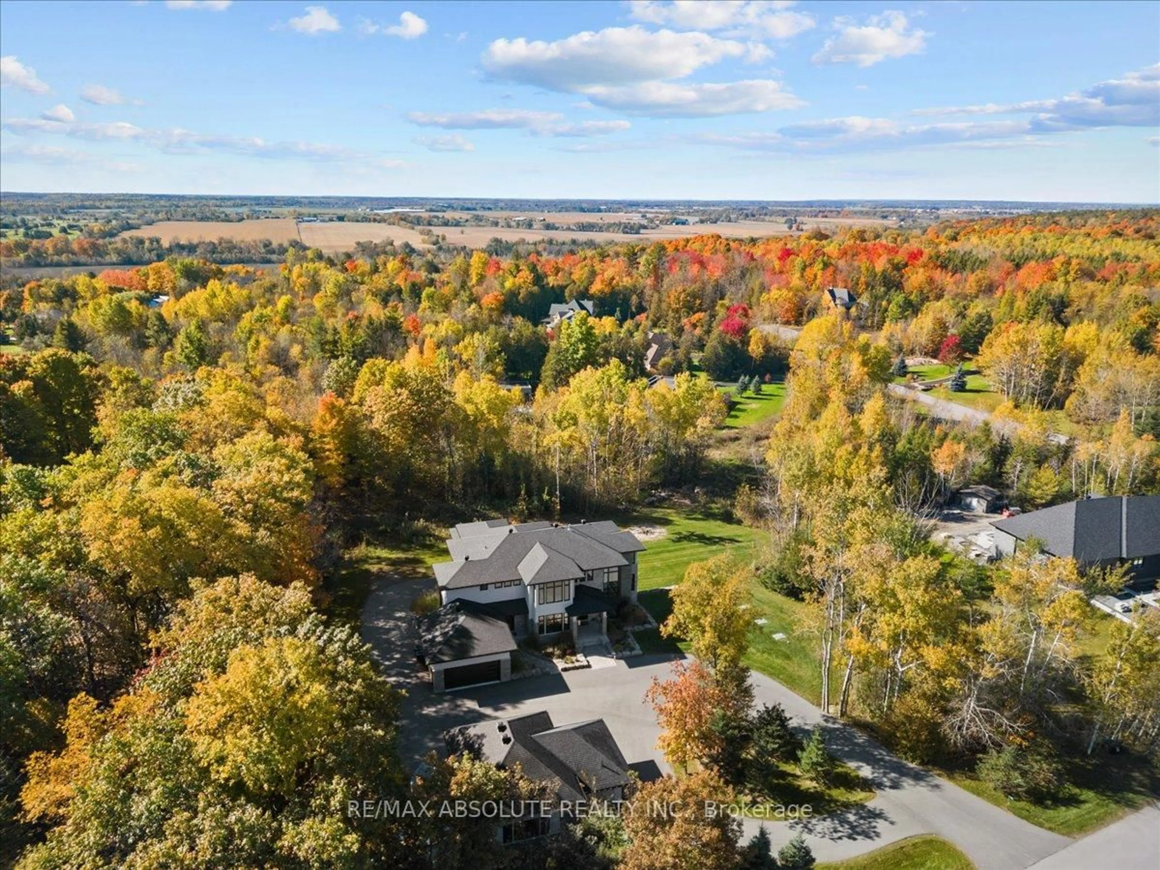 A pic from outside/outdoor area/front of a property/back of a property/a pic from drone, forest/trees view for 131 Cherryhill Dr, Carp Ontario K0A 1L0
