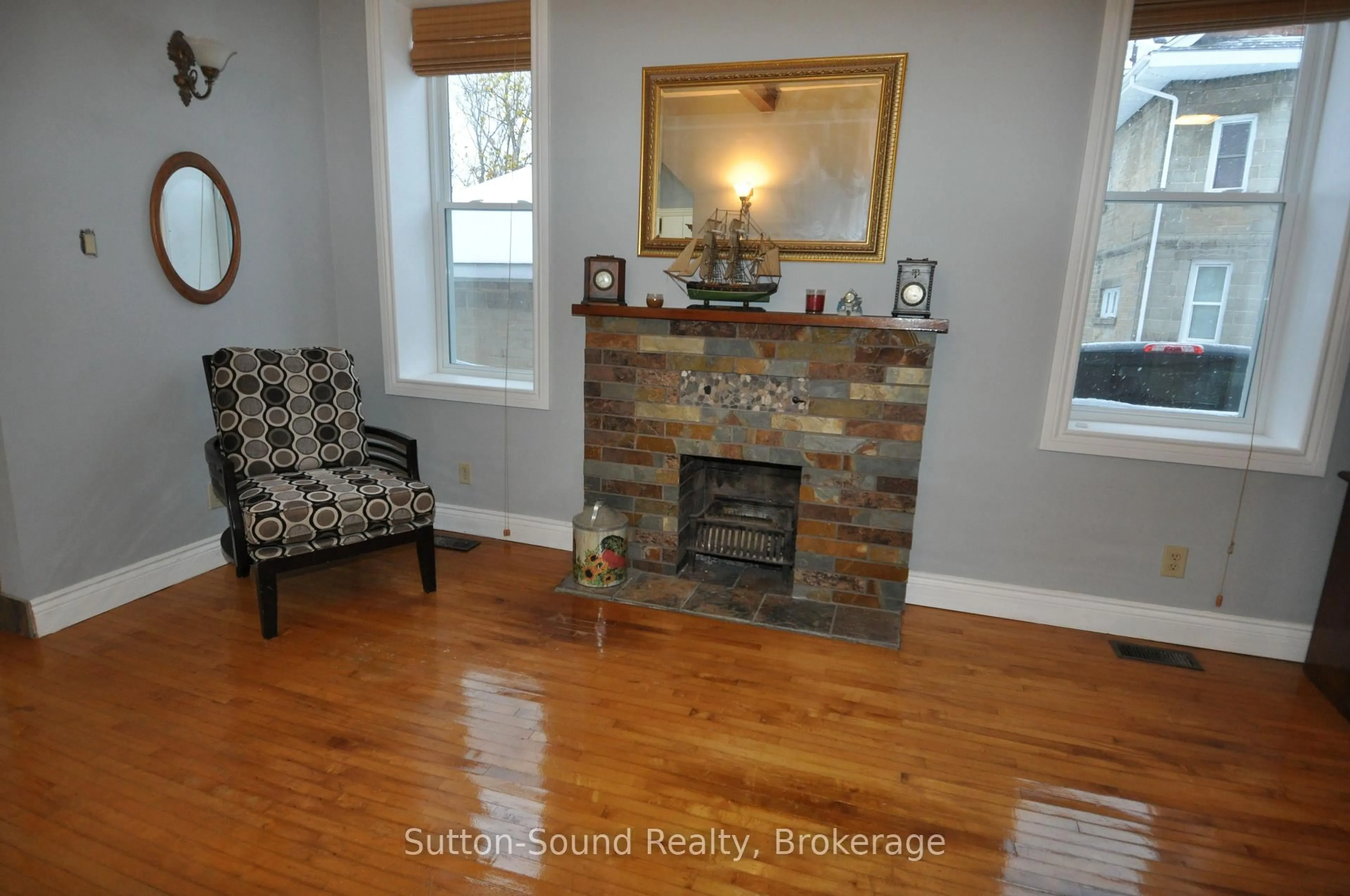 Living room with furniture, wood/laminate floor for 1969 4th Ave, Owen Sound Ontario N4K 4Y1