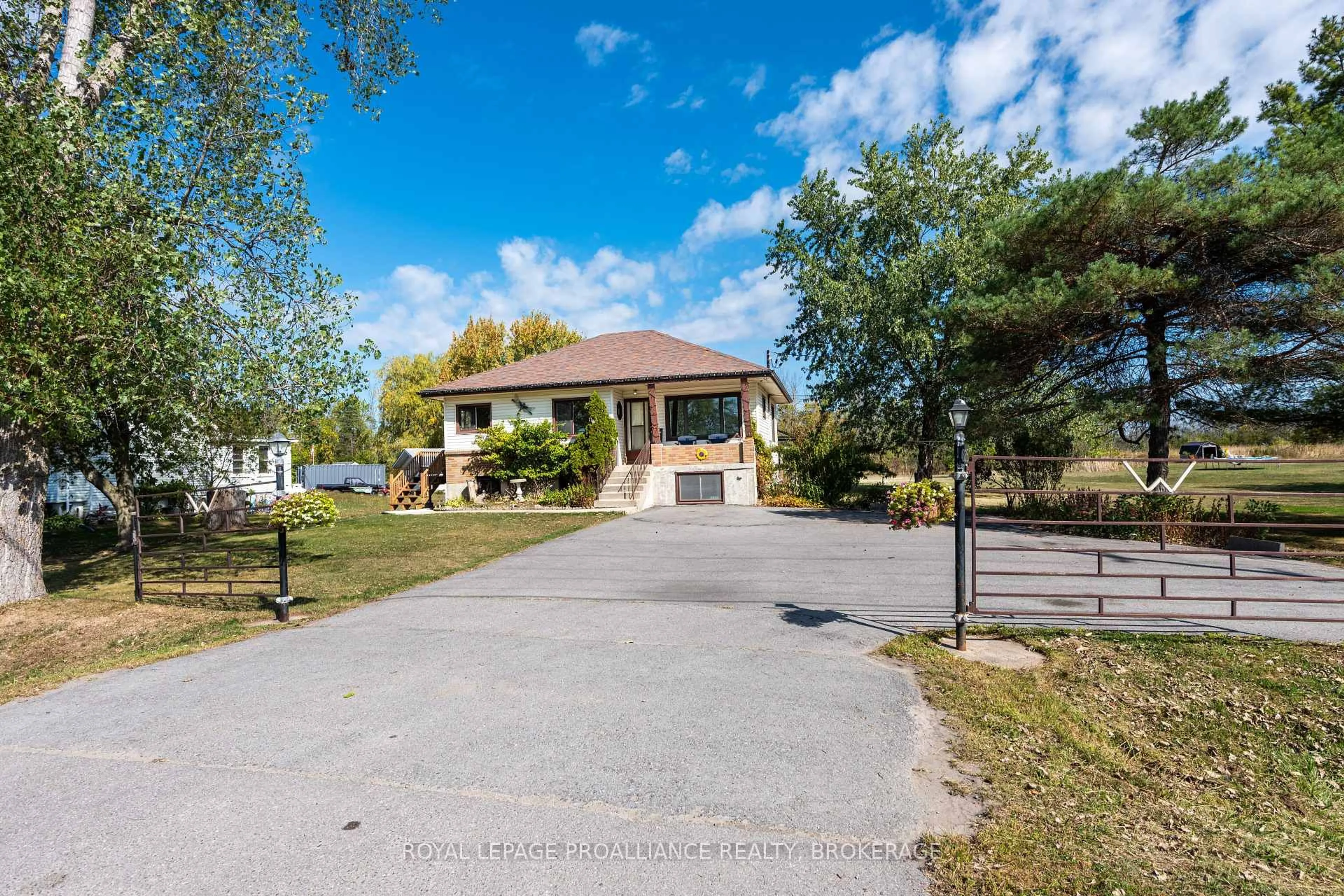 A pic from outside/outdoor area/front of a property/back of a property/a pic from drone, street for 4835 County Road 2, Bissett Creek Ontario K0H 2H0