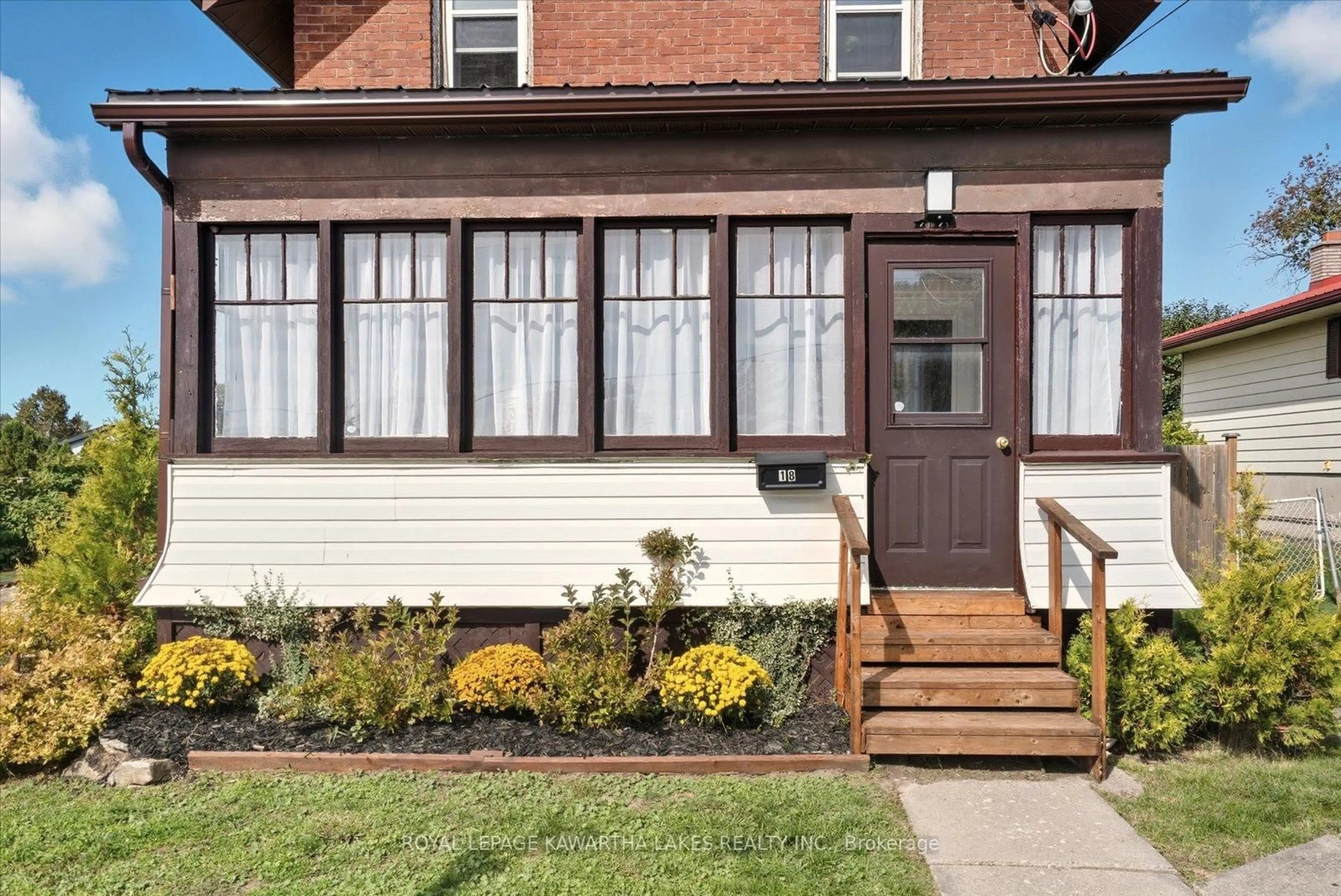 Home with brick exterior material, street for 18 Mary St, Kawartha Lakes Ontario K9V 2N4