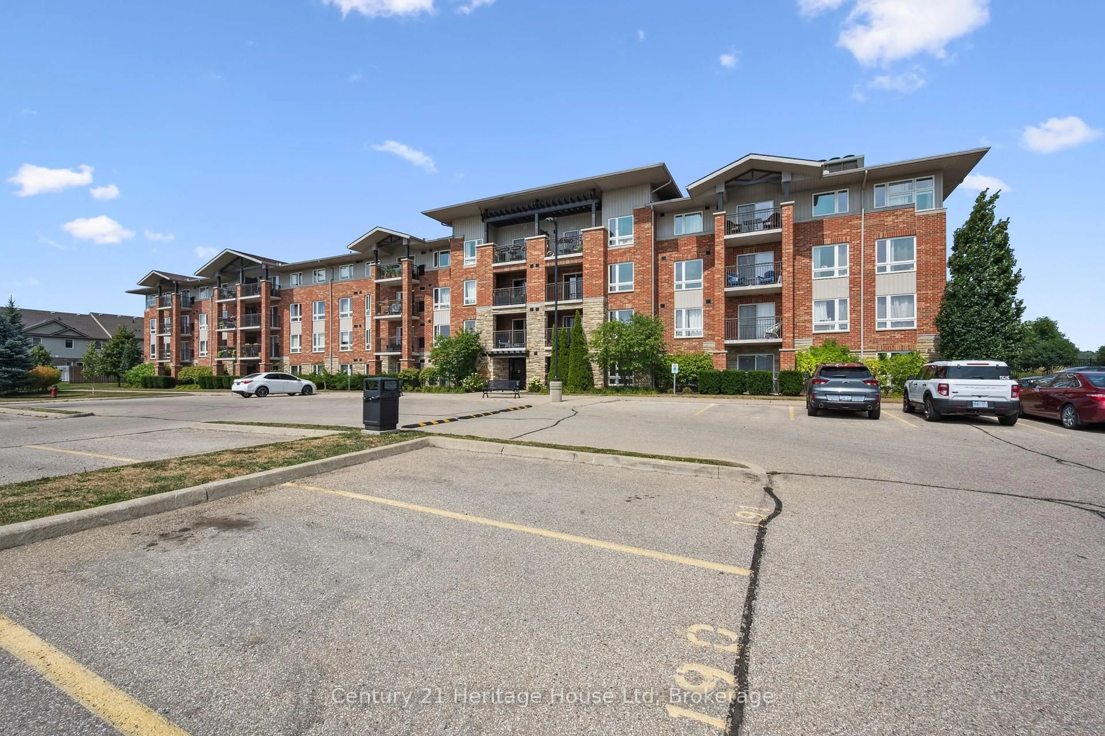 A pic from outside/outdoor area/front of a property/back of a property/a pic from drone, building for 60 Lynnmore St #206, Guelph Ontario N1L 0J8