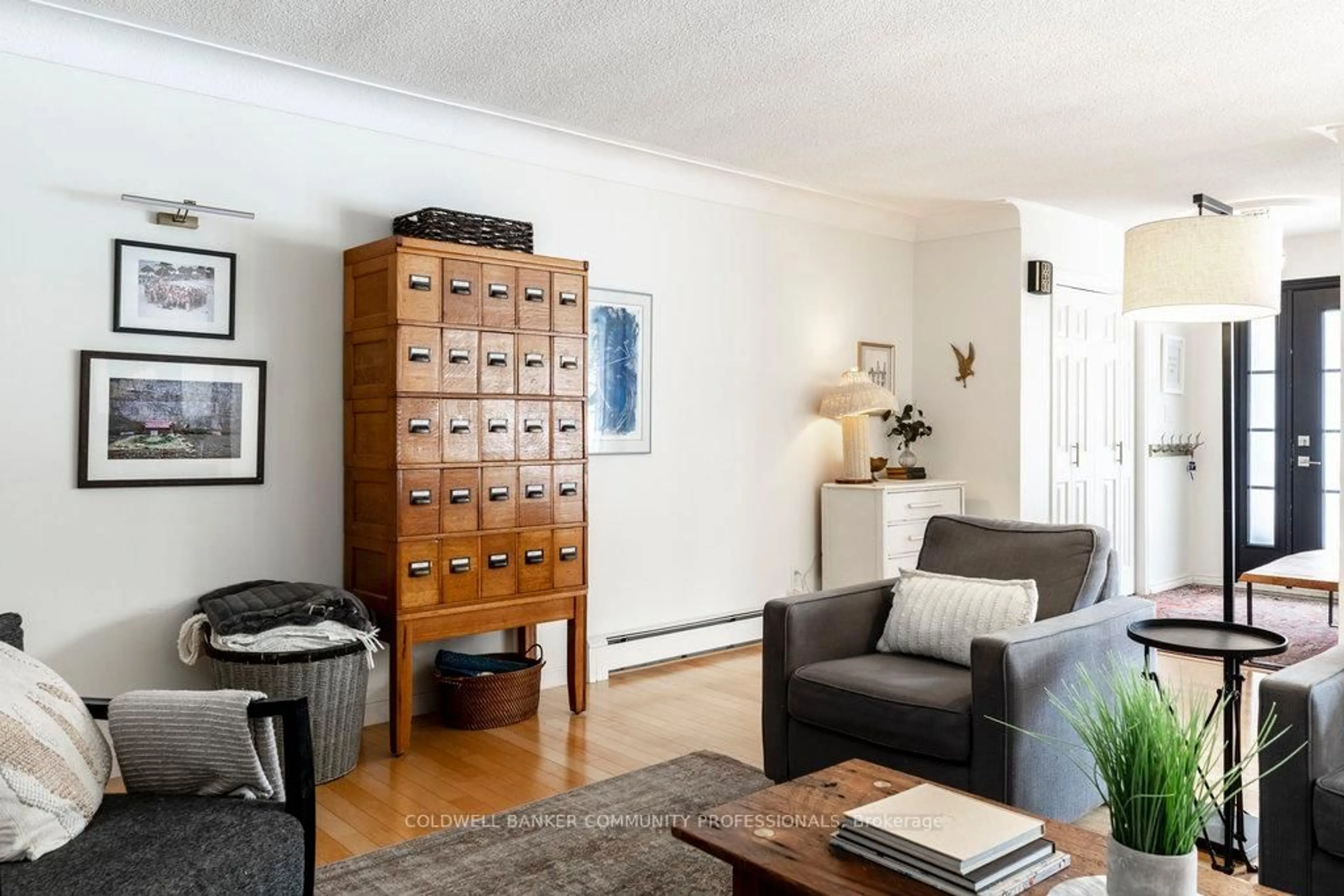 Living room with furniture, wood/laminate floor for 1052 French Rd, Hamilton Ontario L0R 1W0