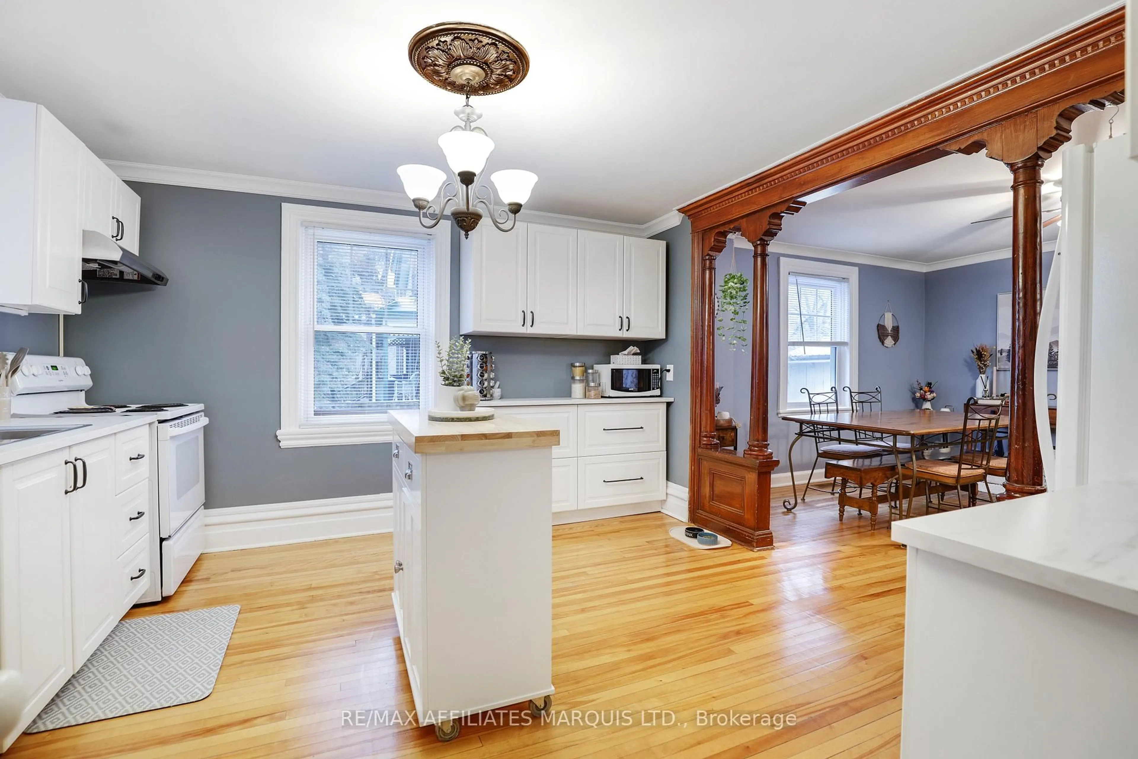 Open concept kitchen, wood/laminate floor for 135 Third St, Cornwall Ontario K6H 2C8