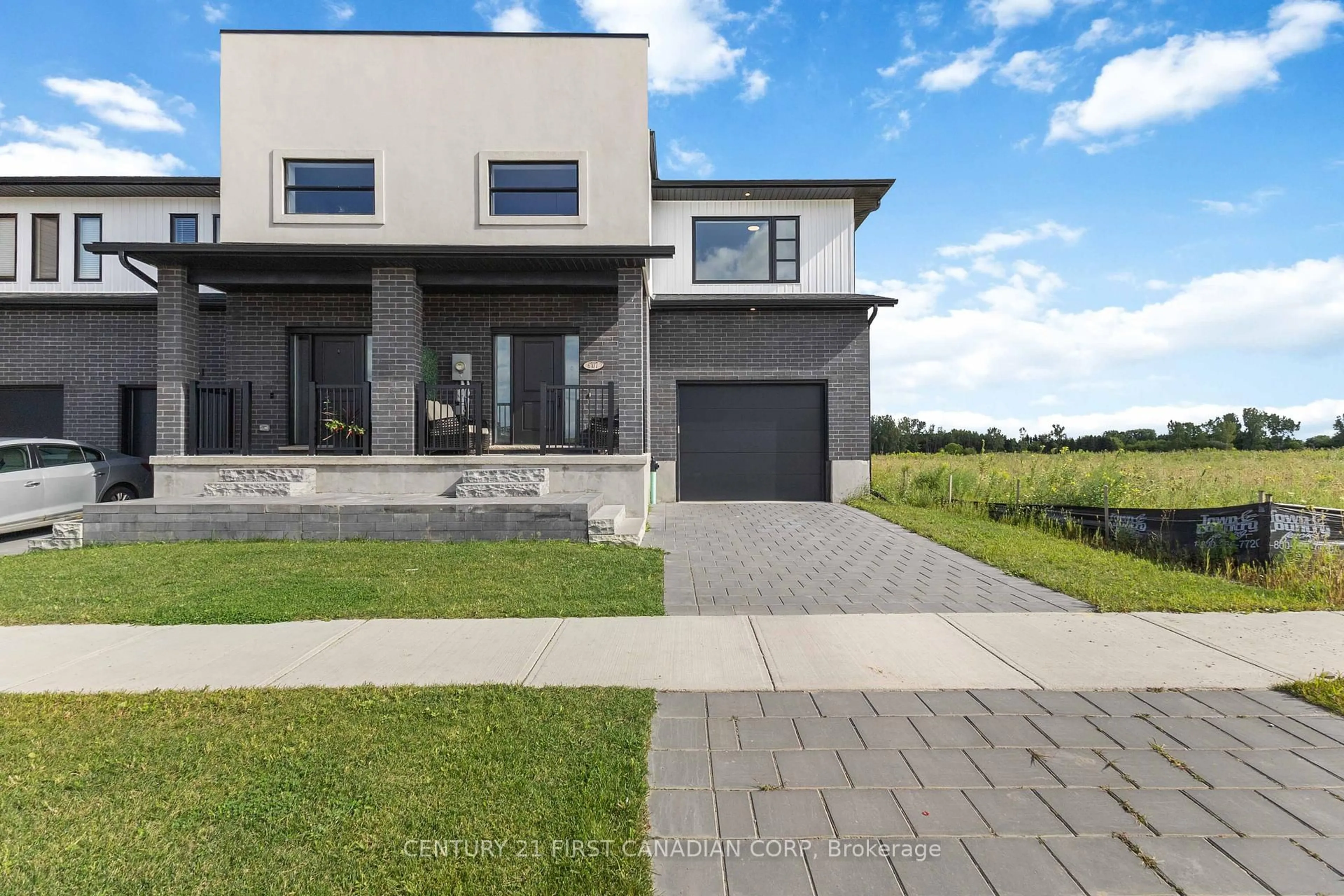 Home with brick exterior material, street for 6707 Royal Magnolia Ave, London South Ontario N6P 1H5