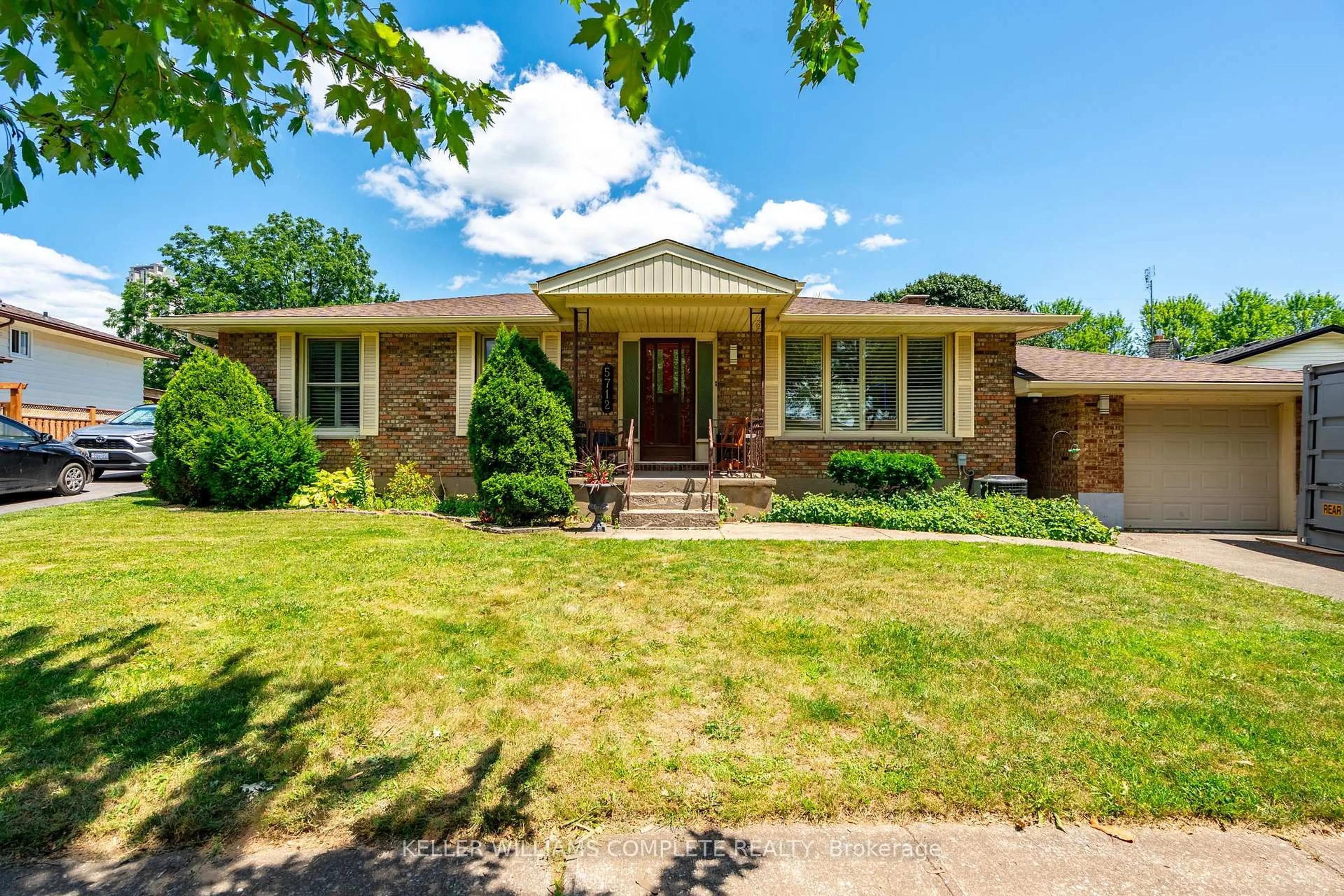 Home with brick exterior material, street for 5712 Sunnylea Cres, Niagara Falls Ontario L2G 2R9