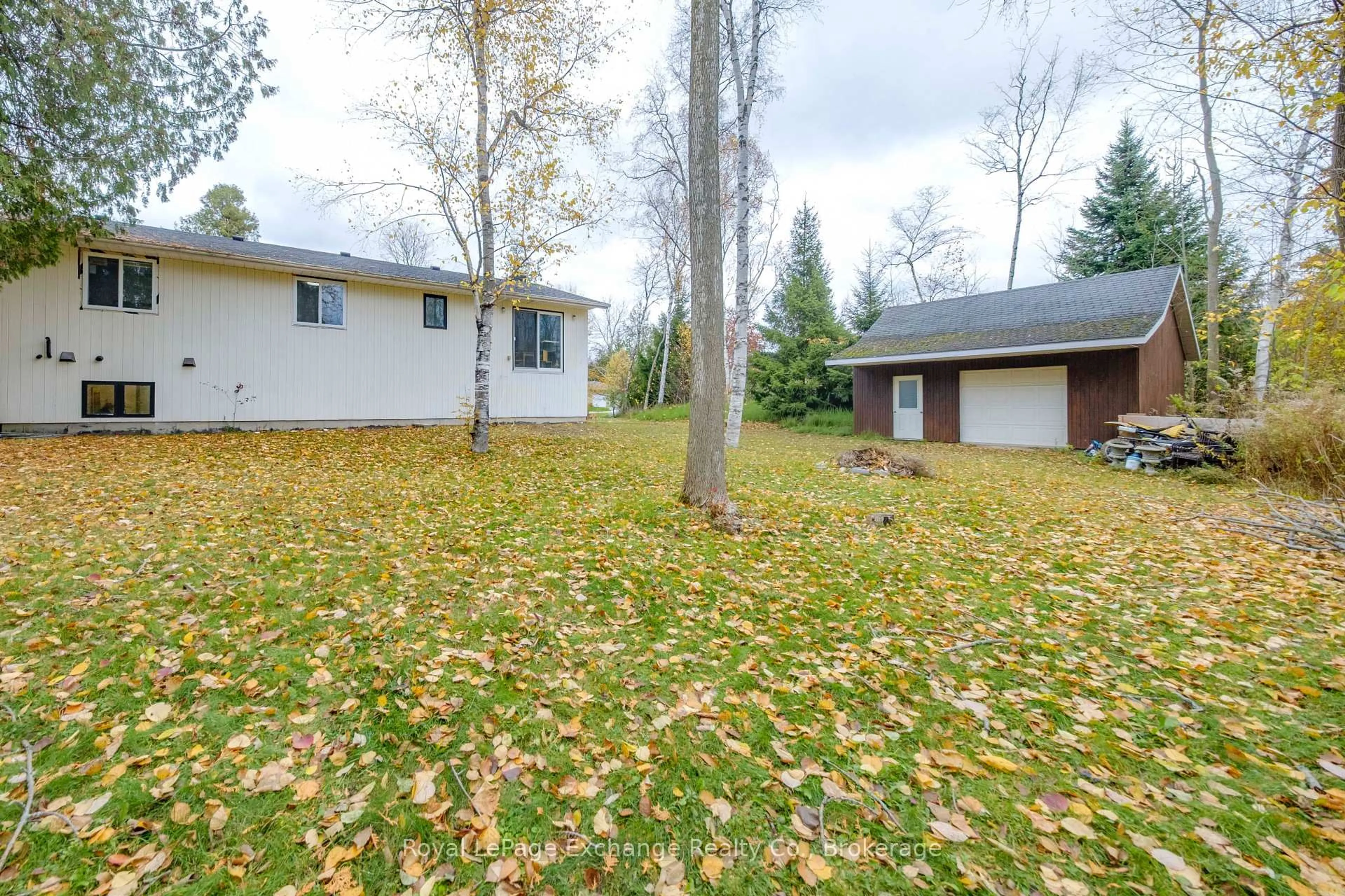 A pic from outside/outdoor area/front of a property/back of a property/a pic from drone, forest/trees view for 27 Dawson Dr, Kincardine Ontario N2Z 2X6