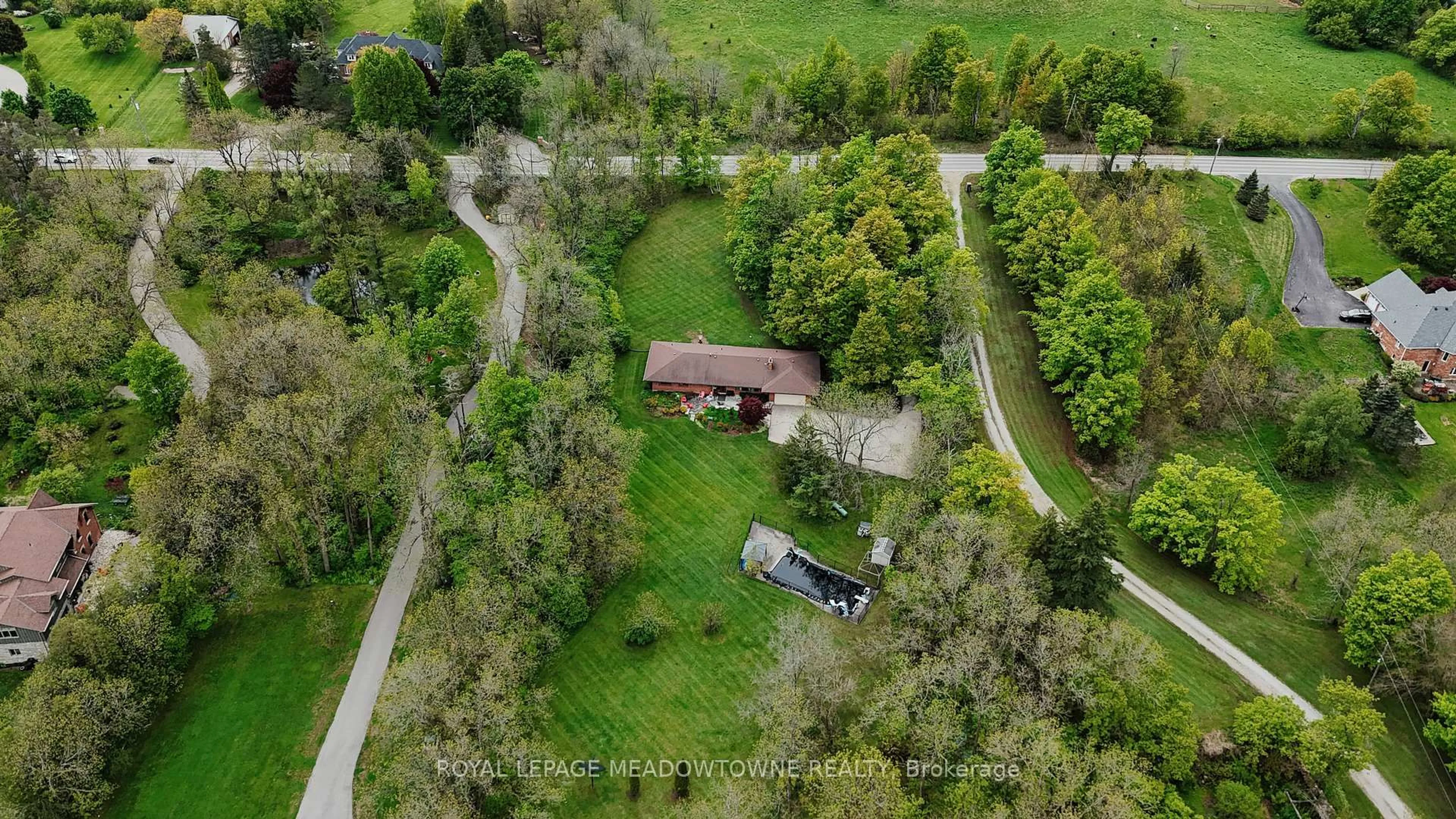 A pic from outside/outdoor area/front of a property/back of a property/a pic from drone, forest/trees view for 4711 Watson Rd, Puslinch Ontario N0B 2J0