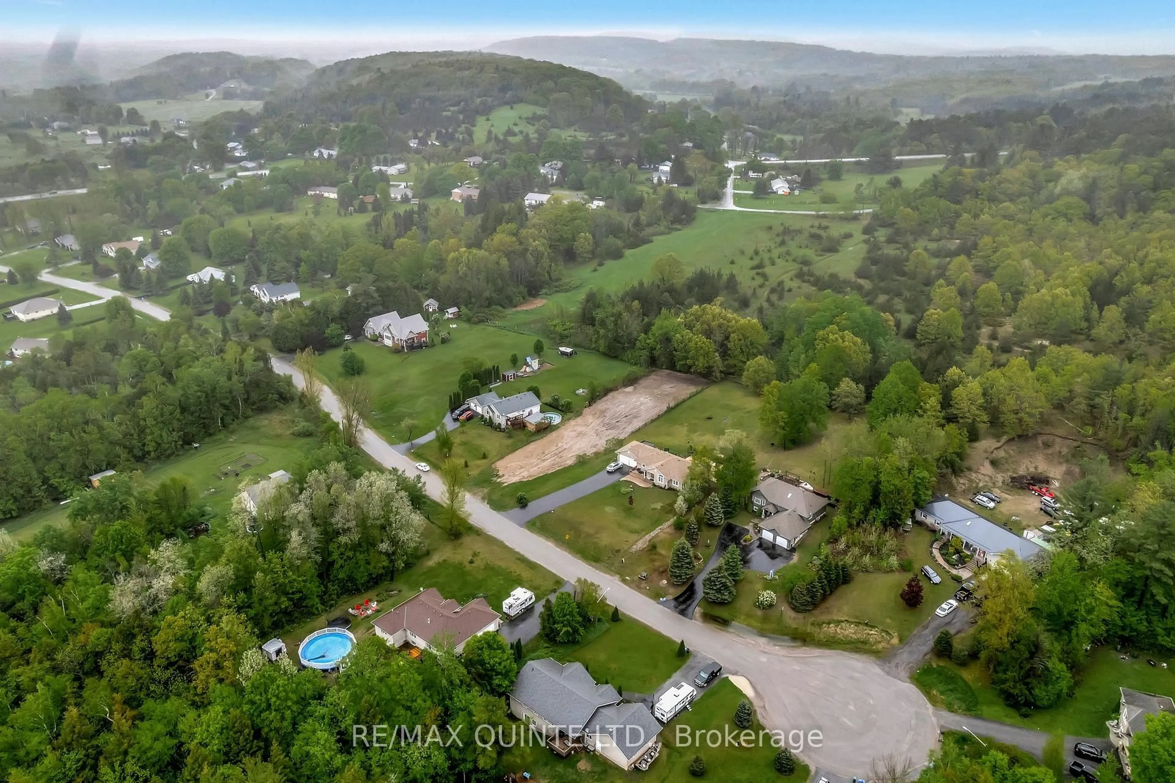A pic from outside/outdoor area/front of a property/back of a property/a pic from drone, water/lake/river/ocean view for 43 DEERFIELD Dr, Hastings Ontario K0K 2C0