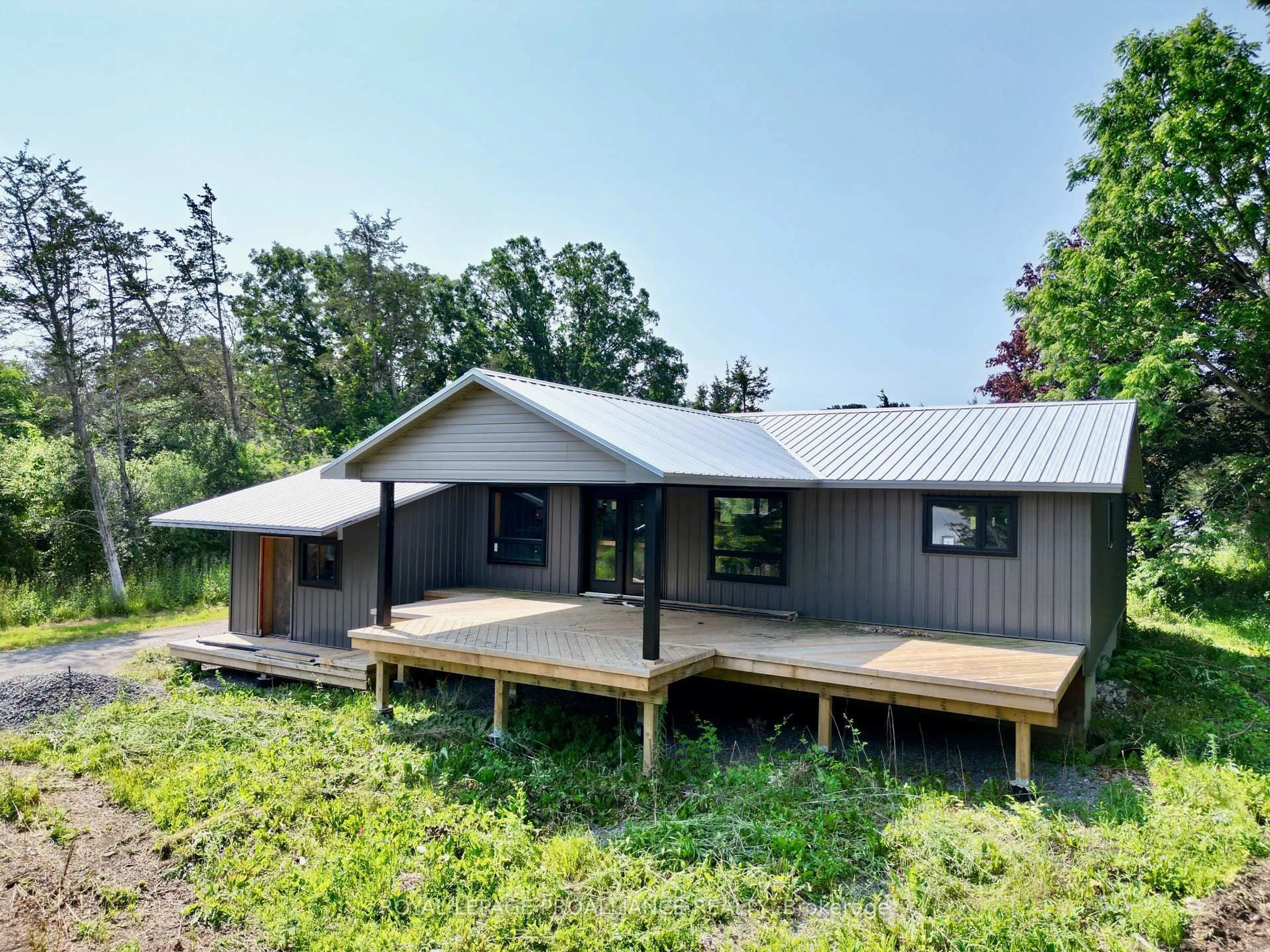 Home with vinyl exterior material, building for 3628 County Road 1, Prince Edward County Ontario K0K 1G0