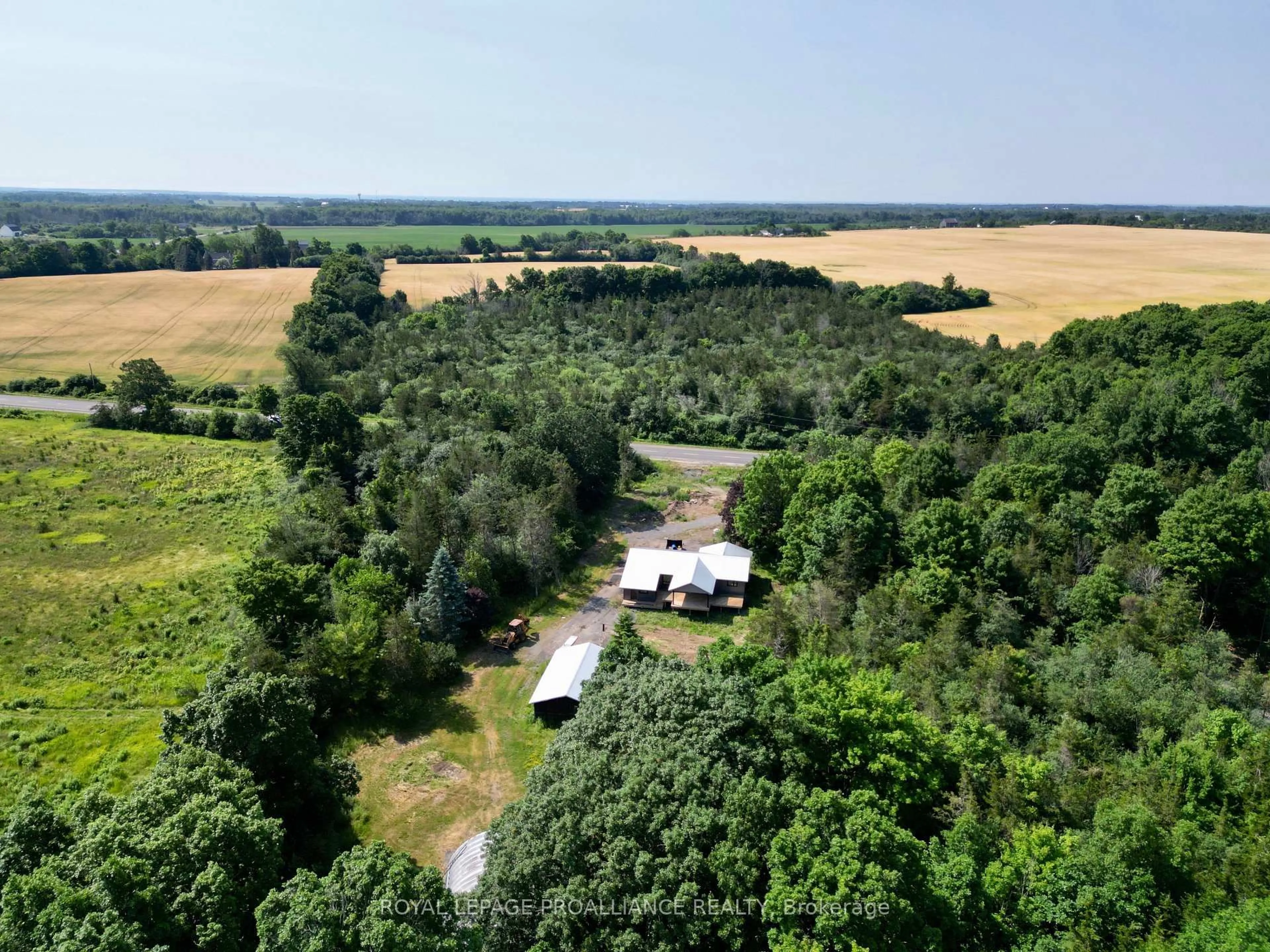 A pic from outside/outdoor area/front of a property/back of a property/a pic from drone, forest/trees view for 3628 County Road 1, Prince Edward County Ontario K0K 1G0