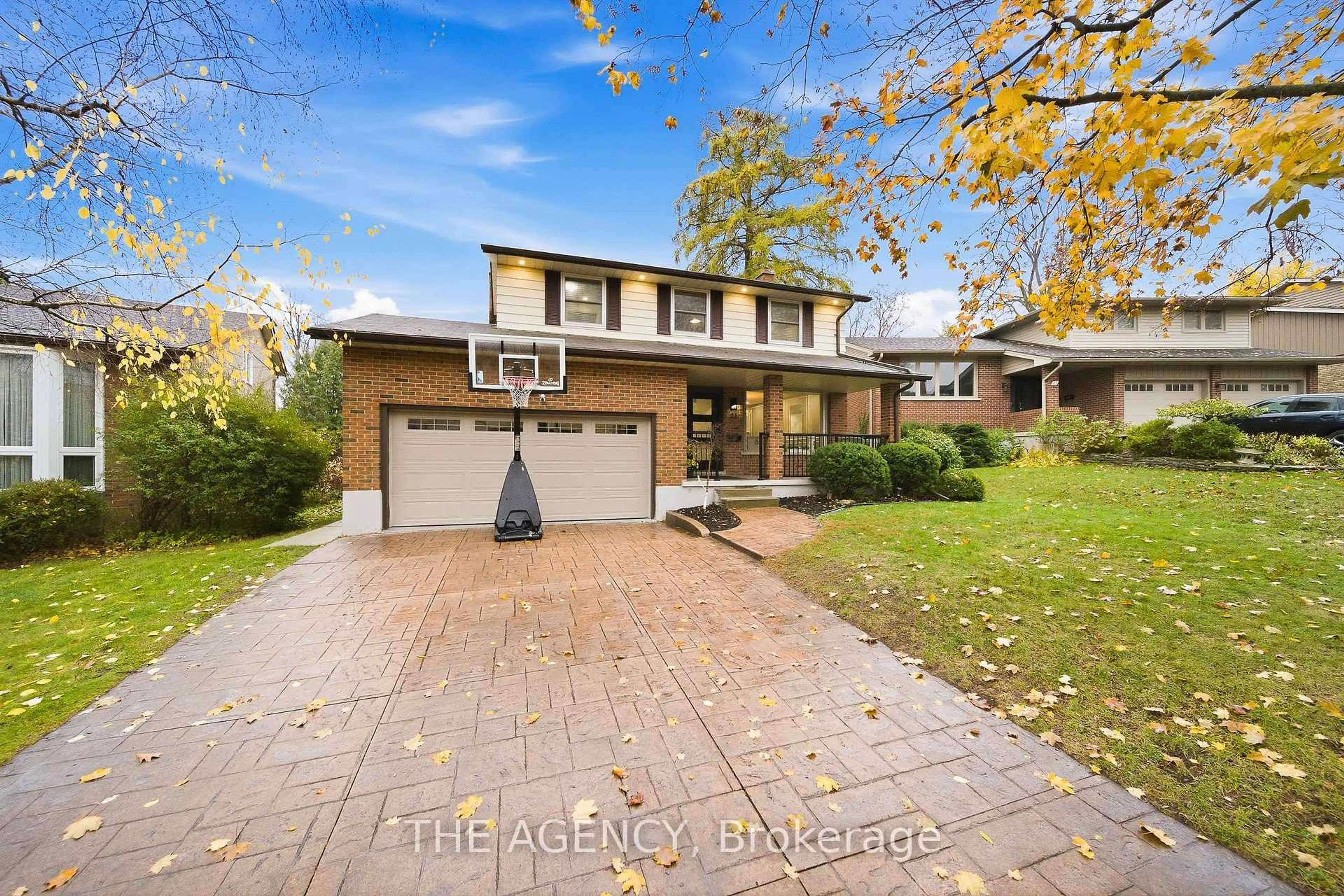 Home with brick exterior material, street for 23 Stonegate Dr, Kitchener Ontario N2A 2Y7