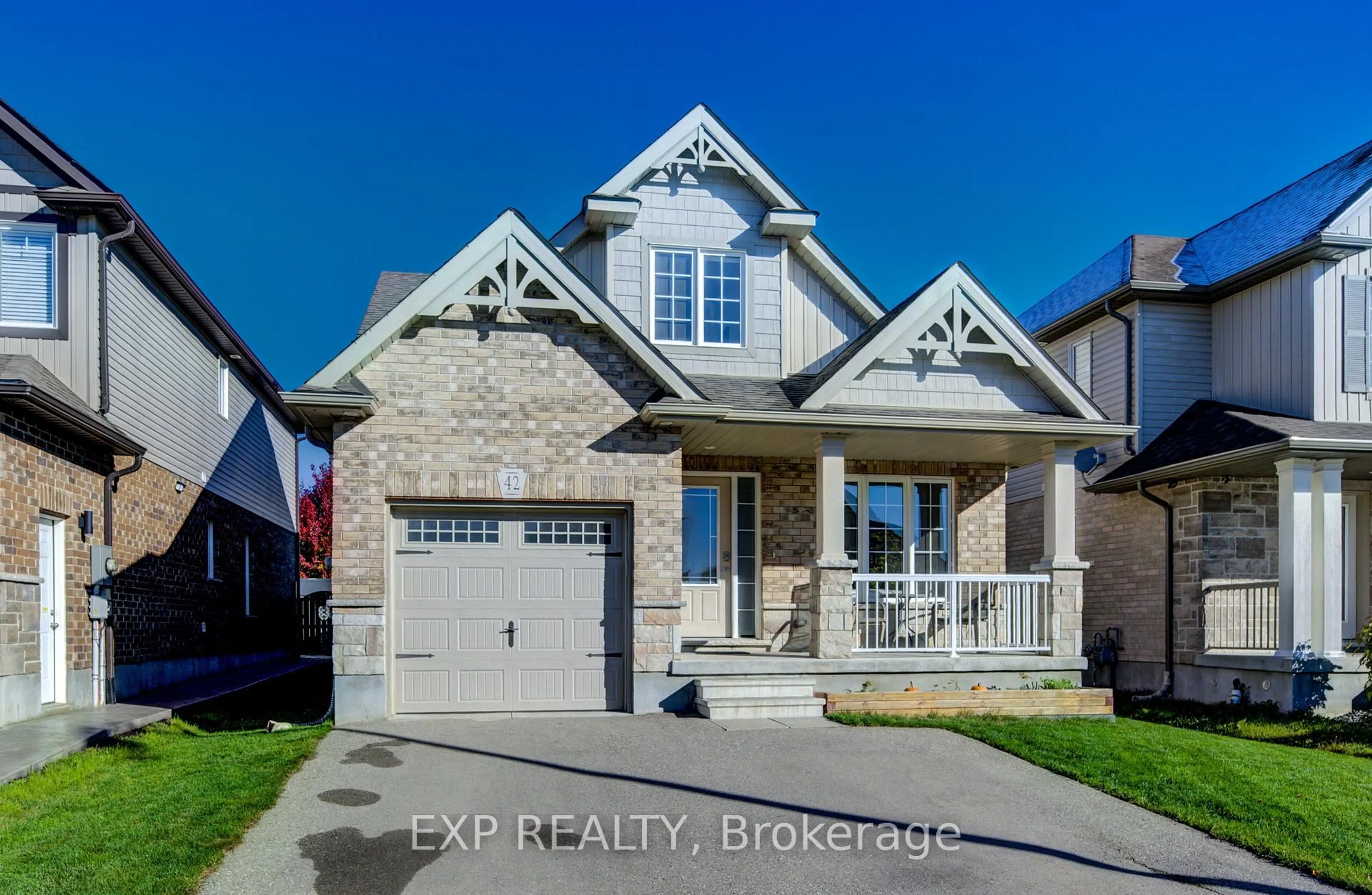 Home with brick exterior material, street for 42 Finoro Cres, Woolwich Ontario N3B 0C3