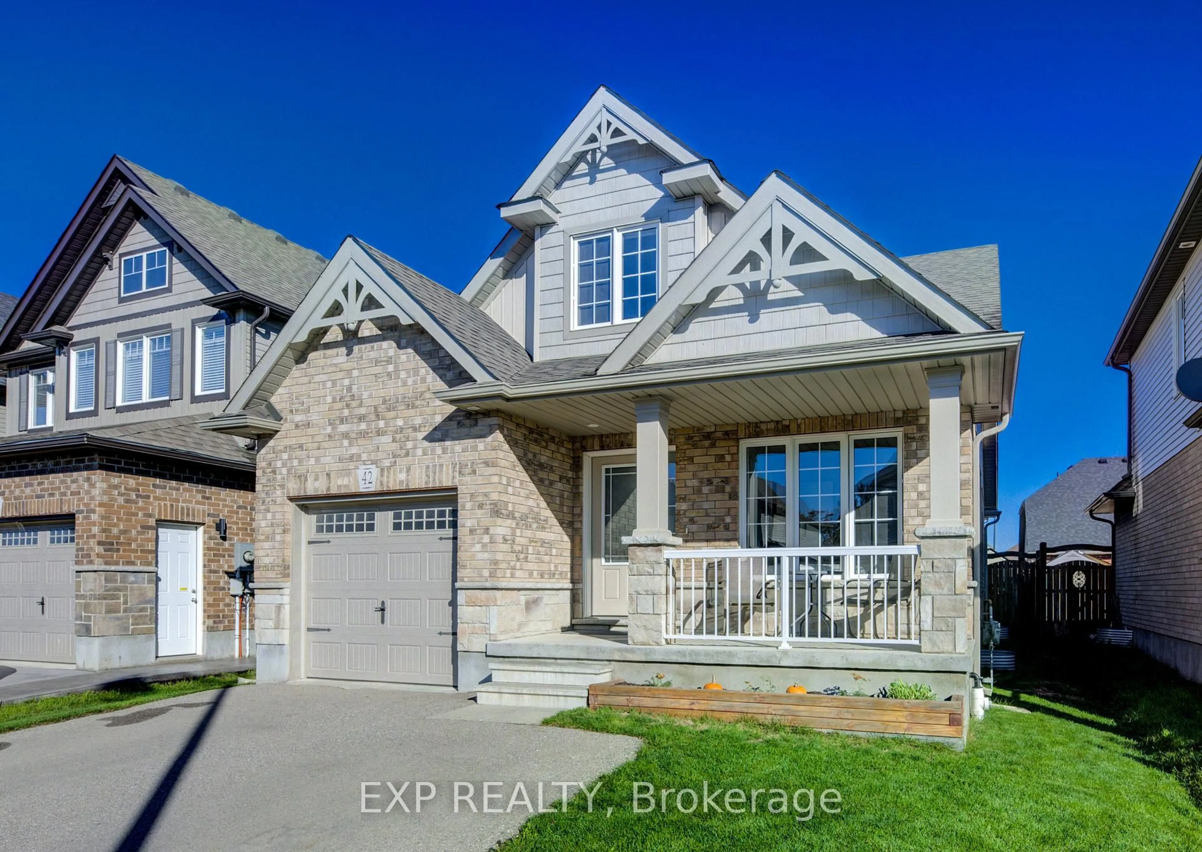 Home with brick exterior material, street for 42 Finoro Cres, Woolwich Ontario N3B 0C3