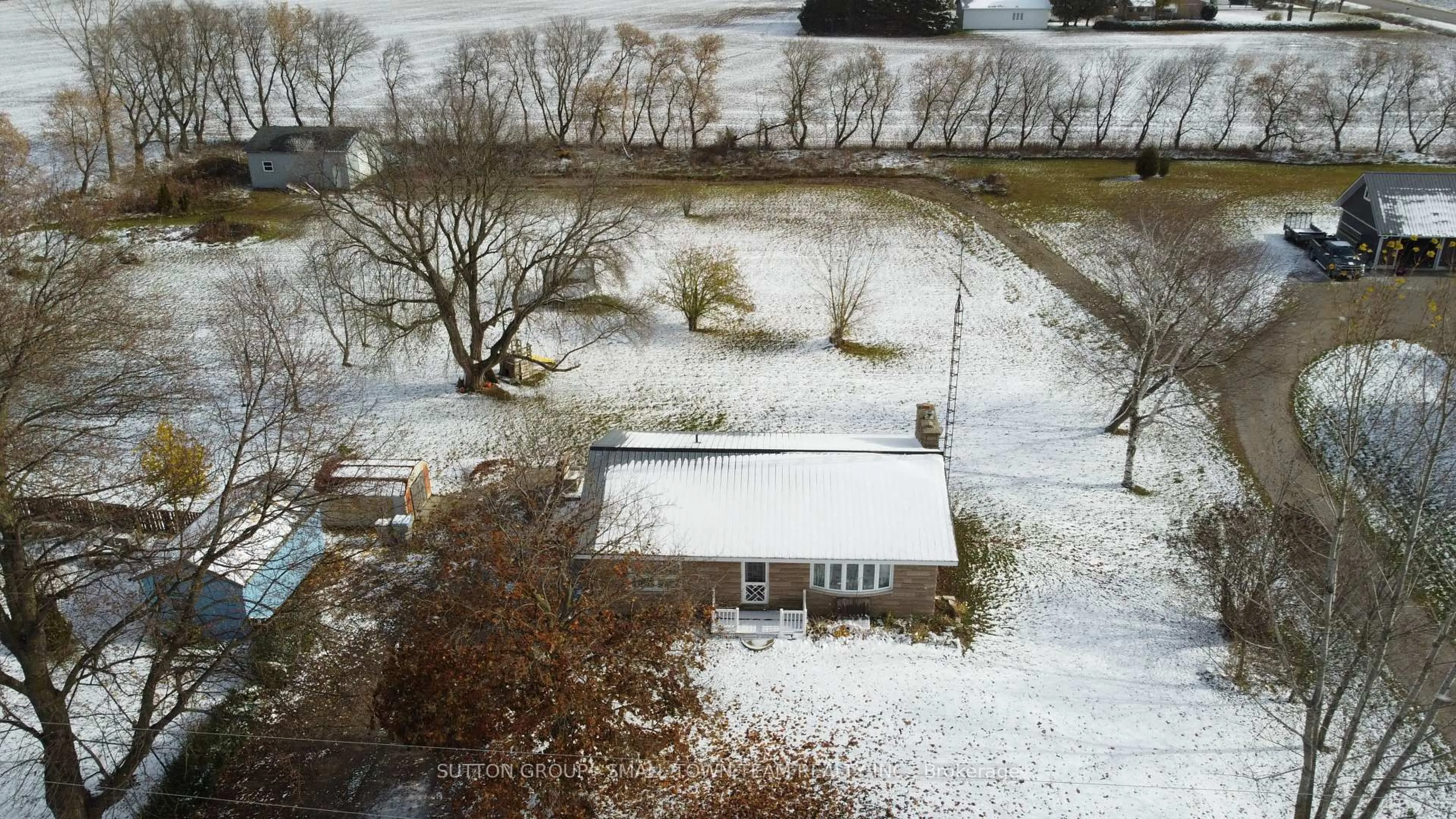 A pic from outside/outdoor area/front of a property/back of a property/a pic from drone, unknown for 69228 Corbett Line, South Huron Ontario N0M 1N0