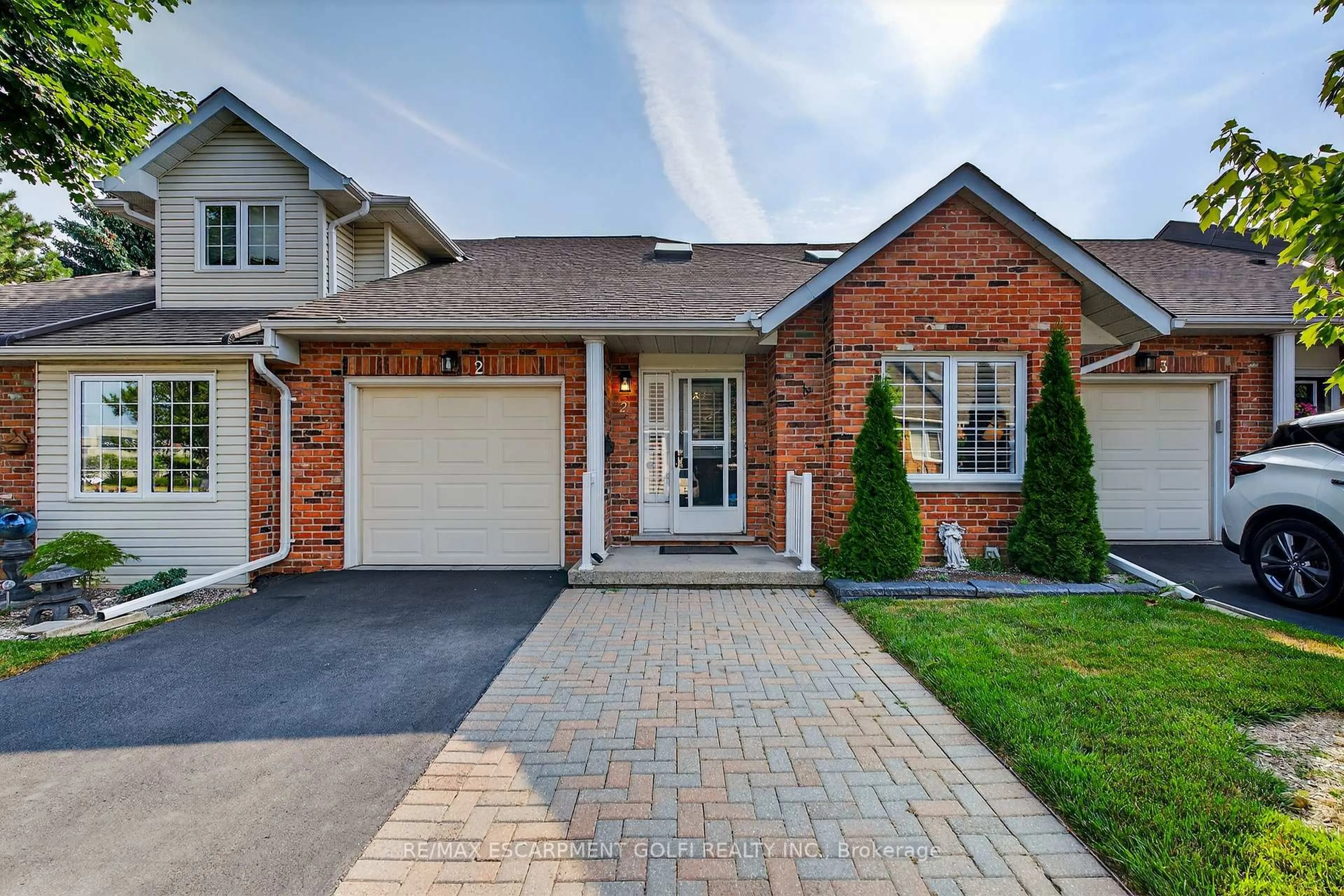 Home with brick exterior material, street for 810 Golf Links Rd #2, Hamilton Ontario L9K 1J7