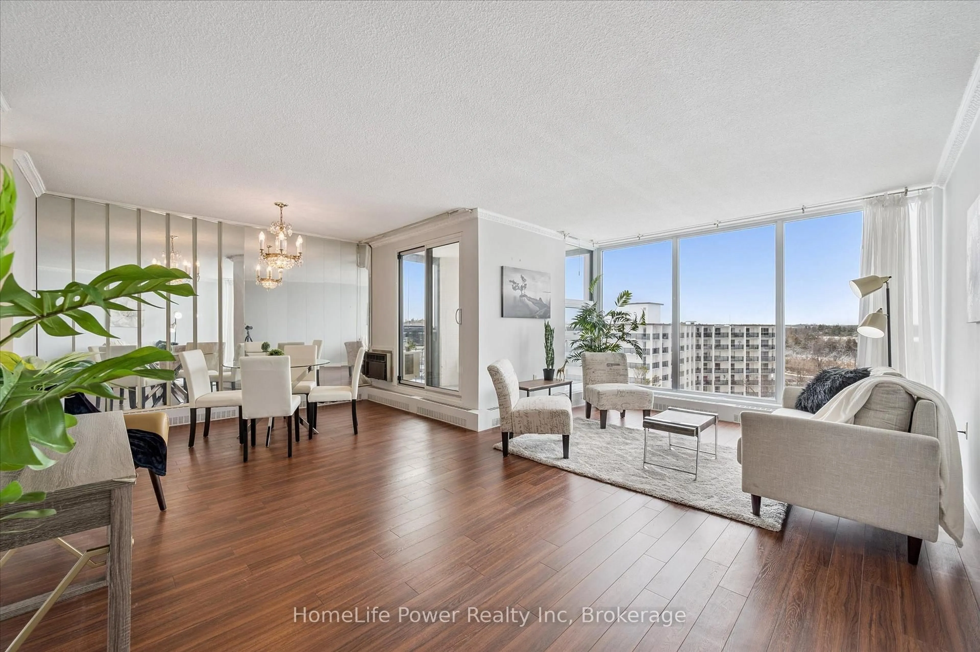 Living room with furniture, unknown for 19 Woodlawn Rd #711, Guelph Ontario N1H 7B1