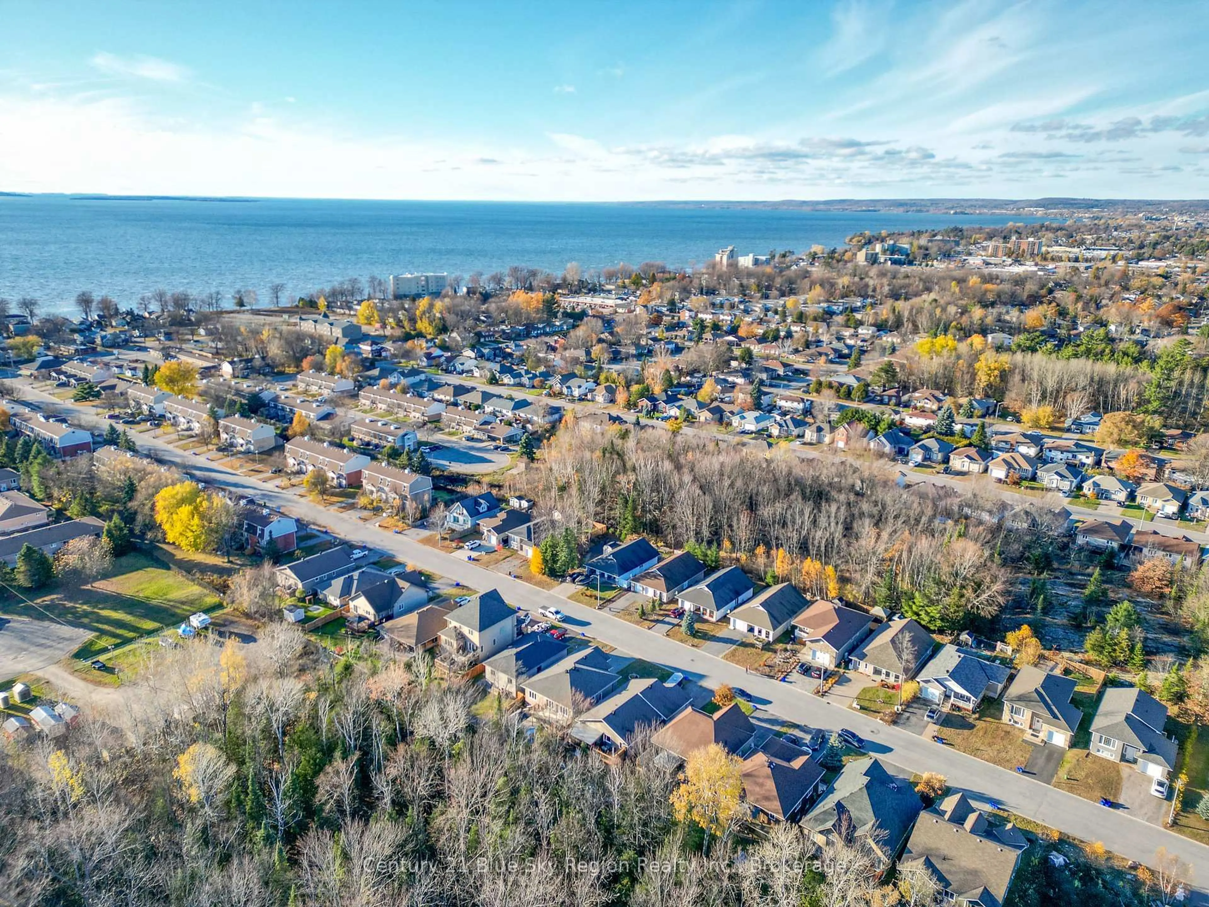 A pic from outside/outdoor area/front of a property/back of a property/a pic from drone, water/lake/river/ocean view for 211 Thelma Ave, North Bay Ontario P1A 4M9