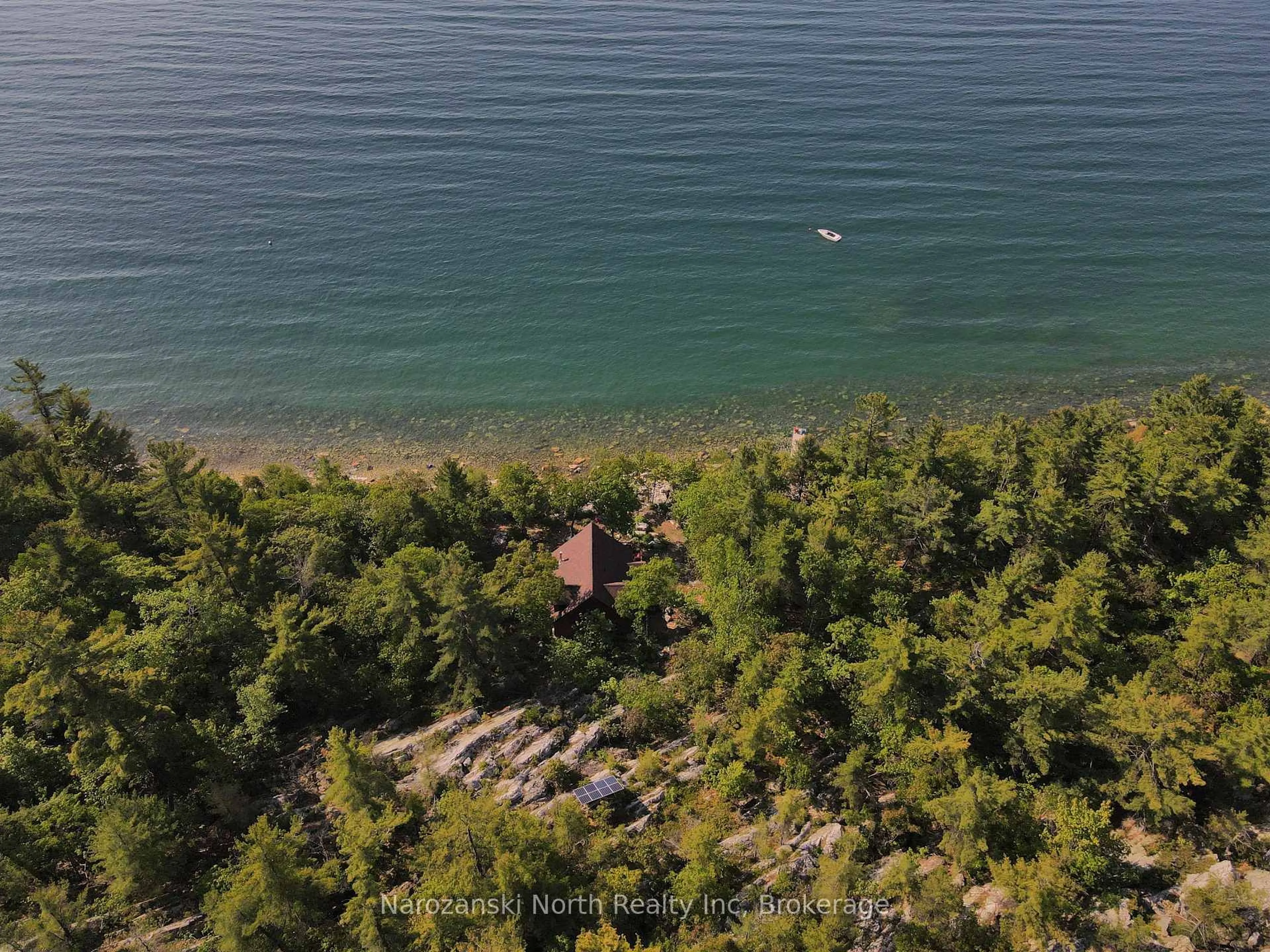 A pic from outside/outdoor area/front of a property/back of a property/a pic from drone, water/lake/river/ocean view for 67 Portage Cove, Killarney Ontario P0M 2A0