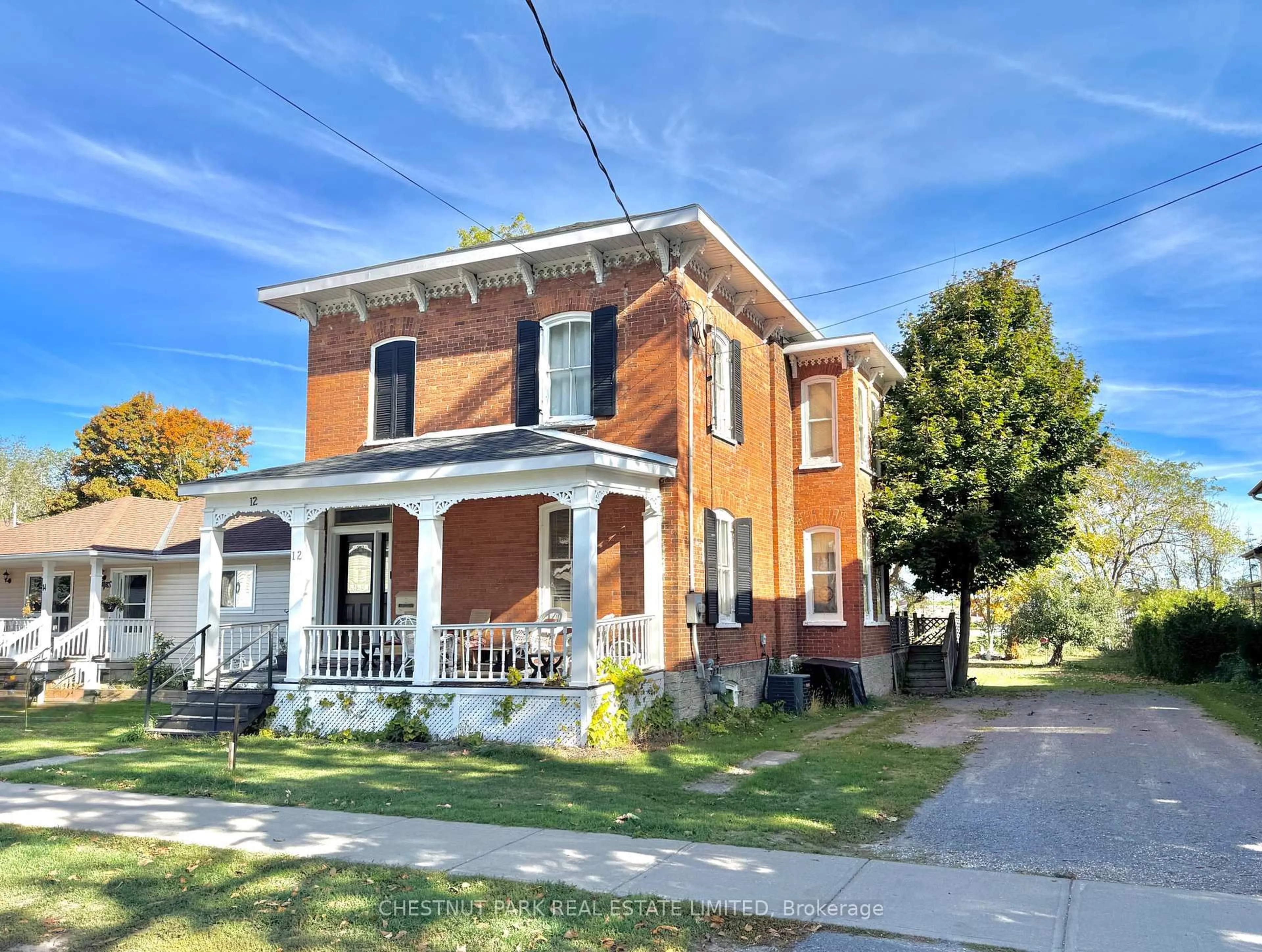 Home with brick exterior material, street for 12 Maple Ave, Prince Edward County Ontario K0K 2T0