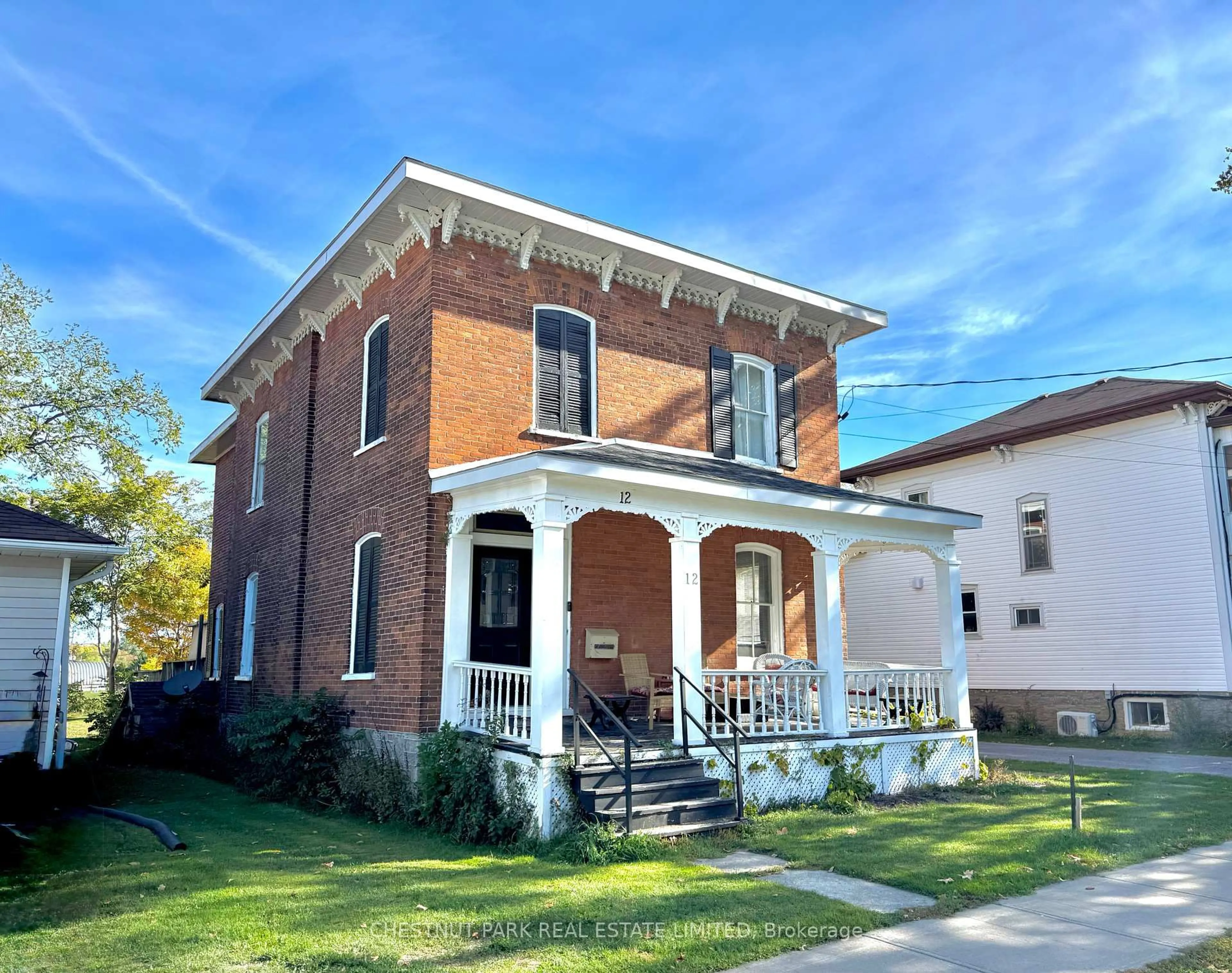 Home with brick exterior material, street for 12 Maple Ave, Prince Edward County Ontario K0K 2T0