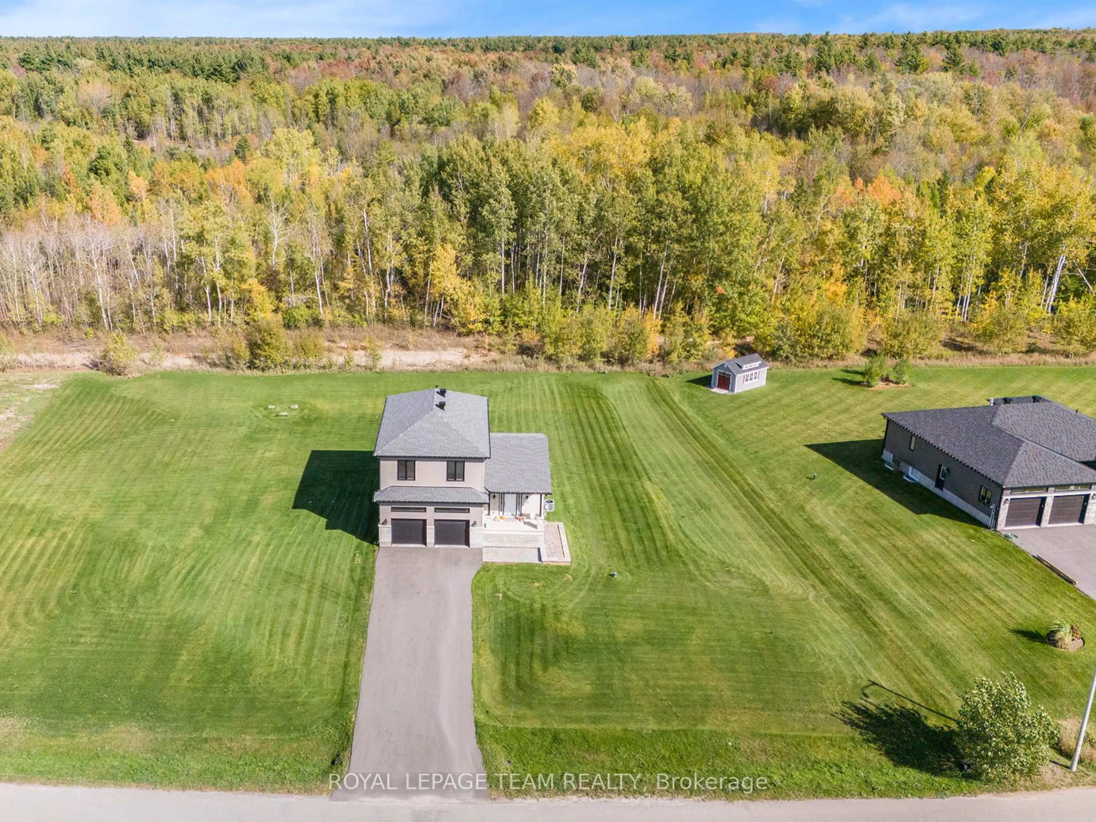 A pic from outside/outdoor area/front of a property/back of a property/a pic from drone, water/lake/river/ocean view for 114 Maplestone Dr, North Grenville Ontario K0G 1J0